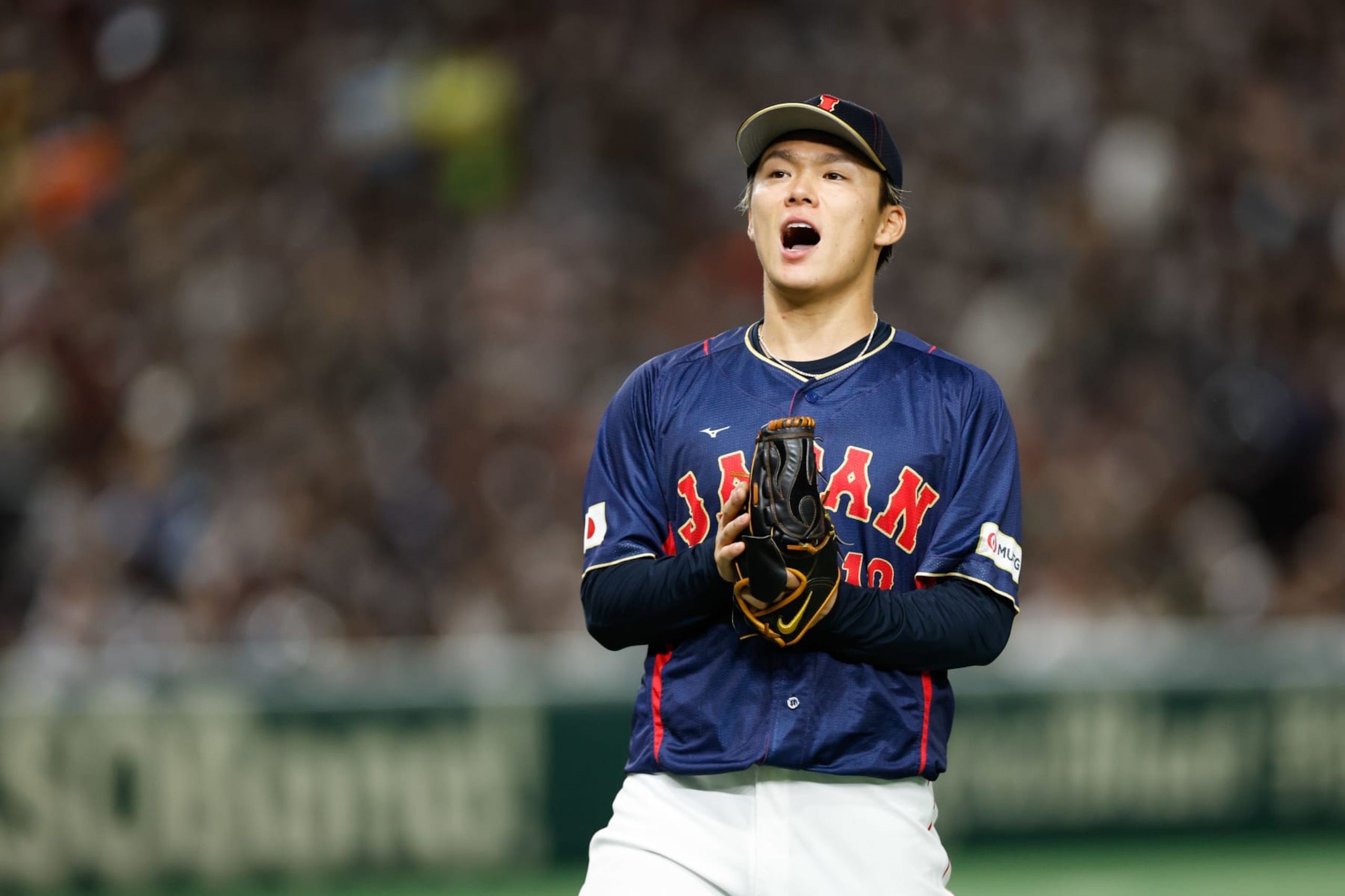 BUNKYO CITY, JAPAN - MARCH 12:   Yoshinobu Yamamoto #18 of Team Japan reacts while pitching during Game 8 of Pool B between Team Japan and Team Australia at Tokyo Dome on Sunday, March 12, 2023 in Bunkyo City, Japan. (Photo by Yuki Taguchi/WBCI/MLB Photos via Getty Images)