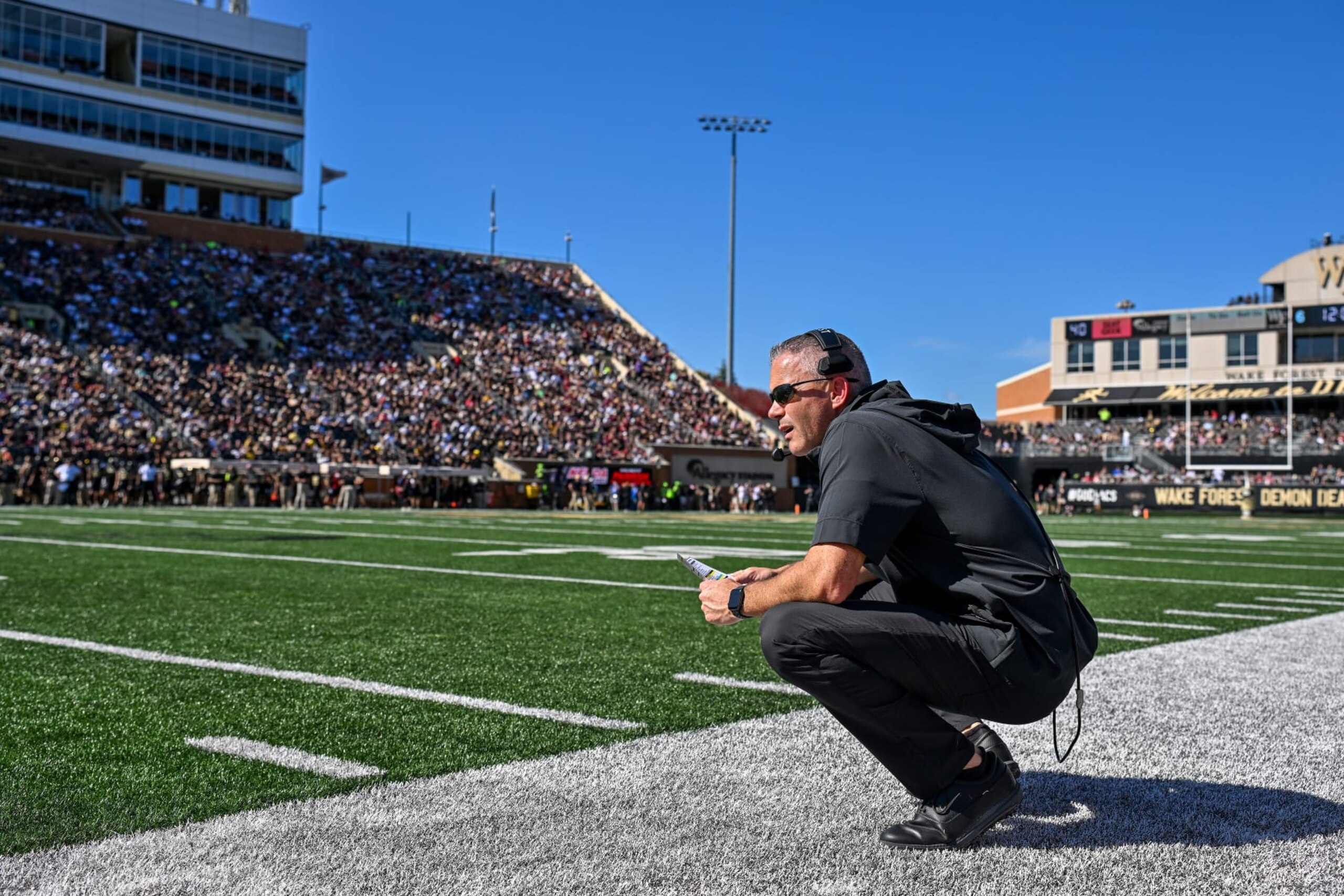WINSTON-SALEM, NORTH CAROLINA - OCTOBER 28: head coach Mike Norvell of the Florida State Seminoles  watches his team play against the Wake Forest Demon Deacons during the first half of their game at Truist Field on October 28, 2023 in Winston-Salem, North Carolina. (Photo by Grant Halverson/Getty Images)