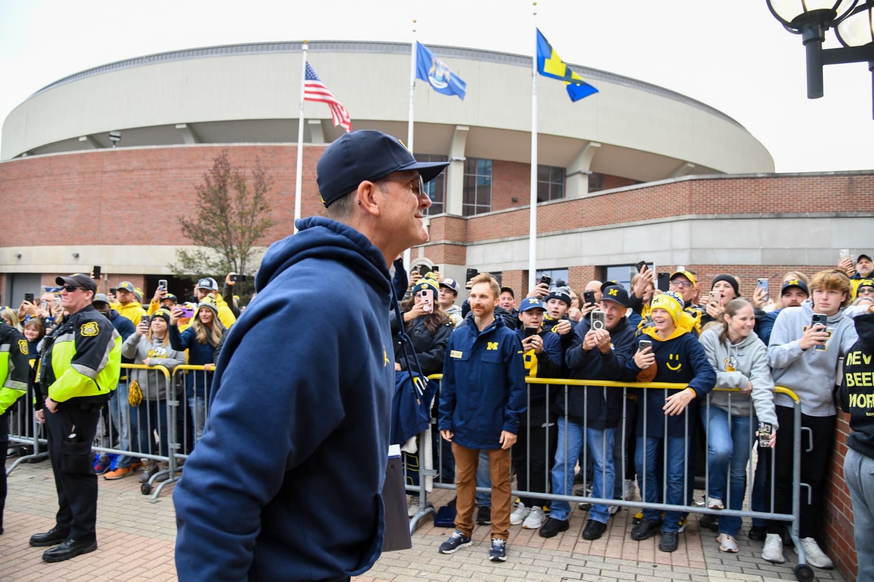 ANN ARBOR, MI - NOVEMBER 04:  Michigan Wolverines head coach Jim Harbaugh comes off of the bus to the locker room during the Michigan Wolverines versus the Purdue Boilermakers on Saturday November 4, 2023 at Michigan Stadium in Ann Arbor, MI. (Photo by Steven King/Icon Sportswire via Getty Images)