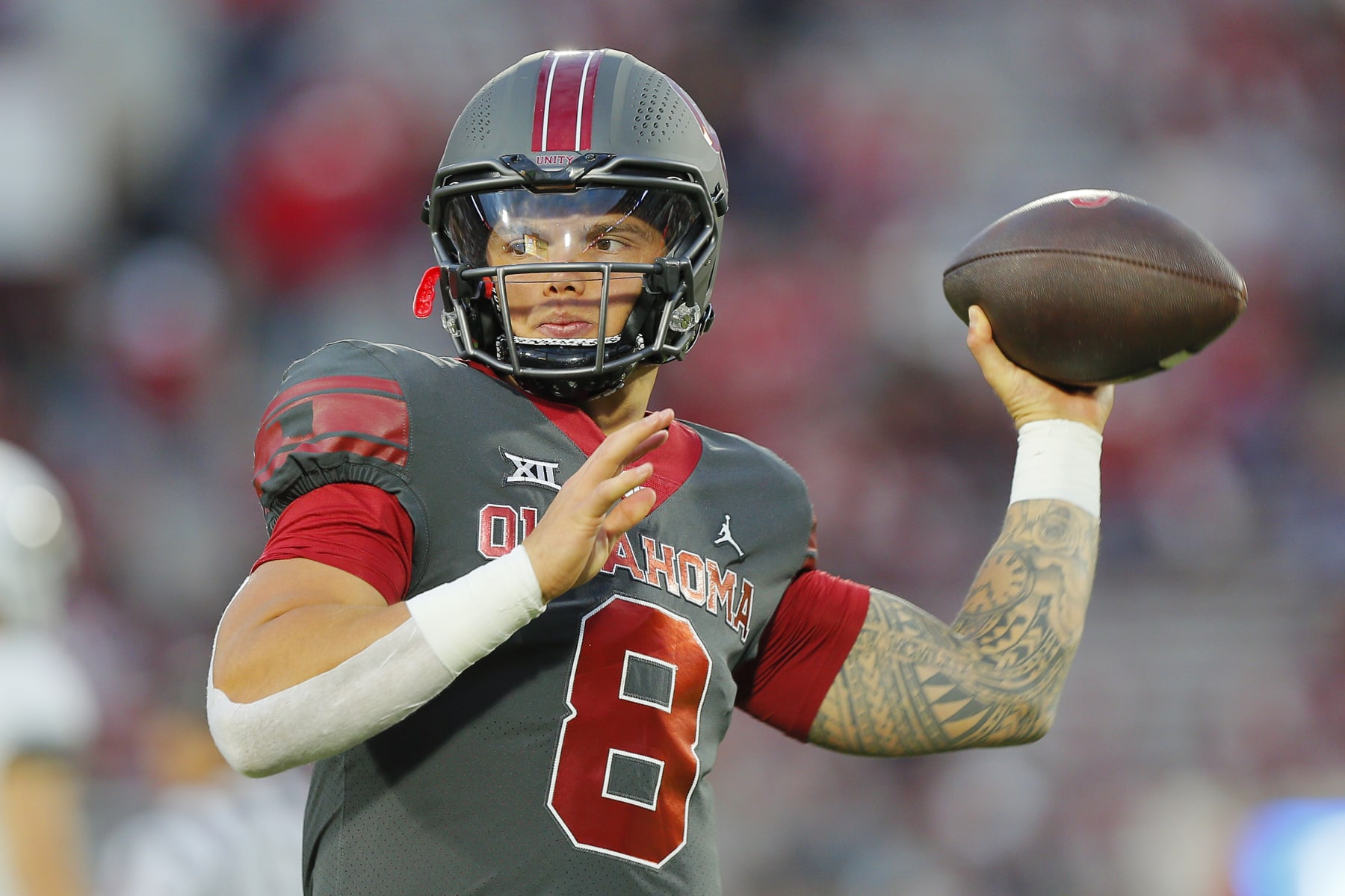 NORMAN, OKLAHOMA - NOVEMBER 11:  Quarterback Dillon Gabriel #8 of the Oklahoma Sooners throws passes before a game against the West Virginia Mountaineers at Gaylord Family Oklahoma Memorial Stadium on November 11, 2023 in Norman, Oklahoma.  (Photo by Brian Bahr/Getty Images)