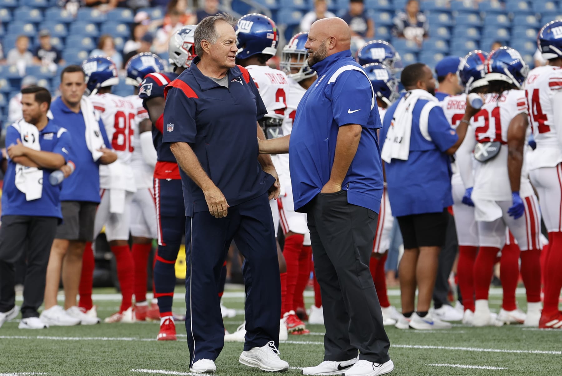 FOXBOROUGH, MA - AUGUST 11: New England Patriots head coach Bill Belichick chats with New York Giants head coach Brian Daboll in warm up before an NFL preseason game between the New England Patriots and the New York Giants on August 11, 2022, at Gillette Stadium in Foxborough, Massachusetts. (Photo by Fred Kfoury III/Icon Sportswire via Getty Images)
