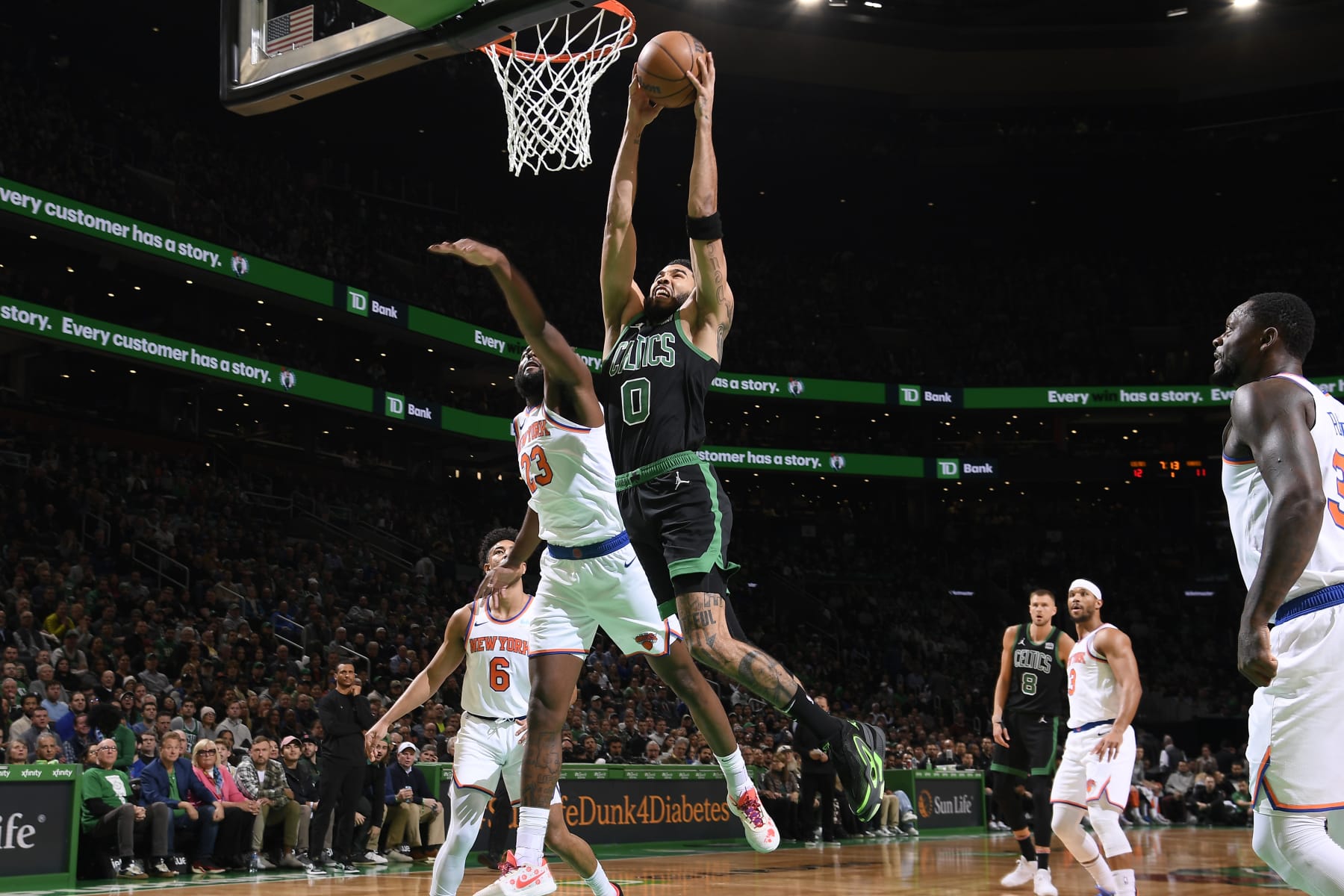 BOSTON, MA - NOVEMBER 13: Jayson Tatum #0 of the Boston Celtics drives to the basket during the game against the New York Knicks on November 13, 2023 at the TD Garden in Boston, Massachusetts. NOTE TO USER: User expressly acknowledges and agrees that, by downloading and or using this photograph, User is consenting to the terms and conditions of the Getty Images License Agreement. Mandatory Copyright Notice: Copyright 2023 NBAE  (Photo by Brian Babineau/NBAE via Getty Images)
