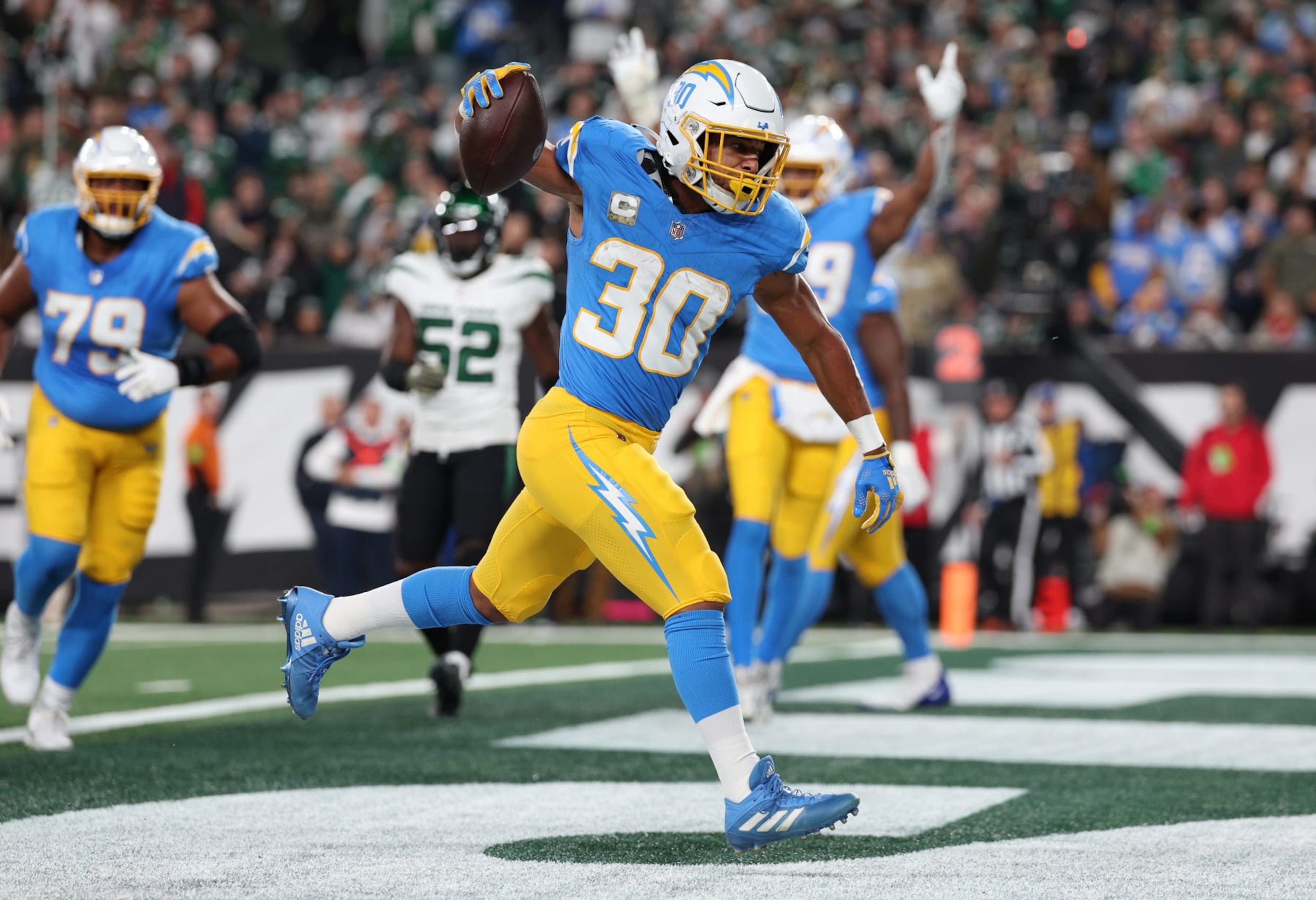 EAST RUTHERFORD, NEW JERSEY - NOVEMBER 06: Austin Ekeler #30 of the Los Angeles Chargers scores a rushing touchdown during the first quarter against the New York Jets at MetLife Stadium on November 06, 2023 in East Rutherford, New Jersey. (Photo by Elsa/Getty Images) EAST RUTHERFORD, NEW JERSEY - NOVEMBER 06: Austin Ekeler #30 of the Los Angeles Chargers scores a rushing touchdown during the first quarter against the New York Jets at MetLife Stadium on November 06, 2023 in East Rutherford, New Jersey. (Photo by Elsa/Getty Images)
