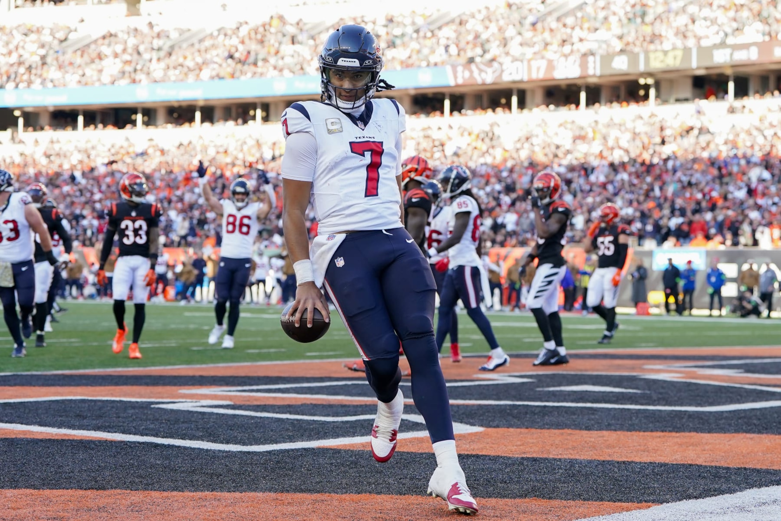 CINCINNATI, OHIO - NOVEMBER 12: C.J. Stroud #7 of the Houston Texans scores a touchdown in the fourth quarter against the Cincinnati Bengals at Paycor Stadium on November 12, 2023 in Cincinnati, Ohio. (Photo by Dylan Buell/Getty Images) CINCINNATI, OHIO - NOVEMBER 12: C.J. Stroud #7 of the Houston Texans scores a touchdown in the fourth quarter against the Cincinnati Bengals at Paycor Stadium on November 12, 2023 in Cincinnati, Ohio. (Photo by Dylan Buell/Getty Images)