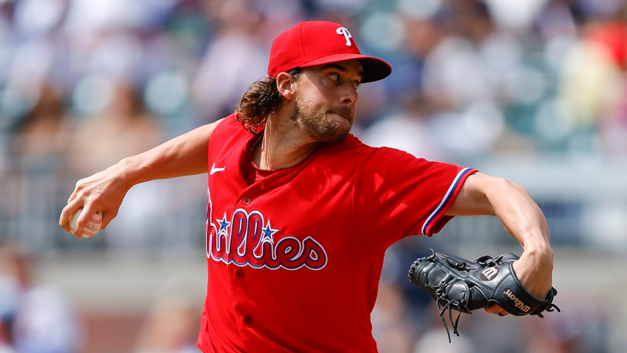 ATLANTA, GEORGIA - SEPTEMBER 20: Aaron Nola #27 of the Philadelphia Phillies pitches during the second inning against the Atlanta Braves at Truist Park on September 20, 2023 in Atlanta, Georgia. (Photo by Todd Kirkland/Getty Images)