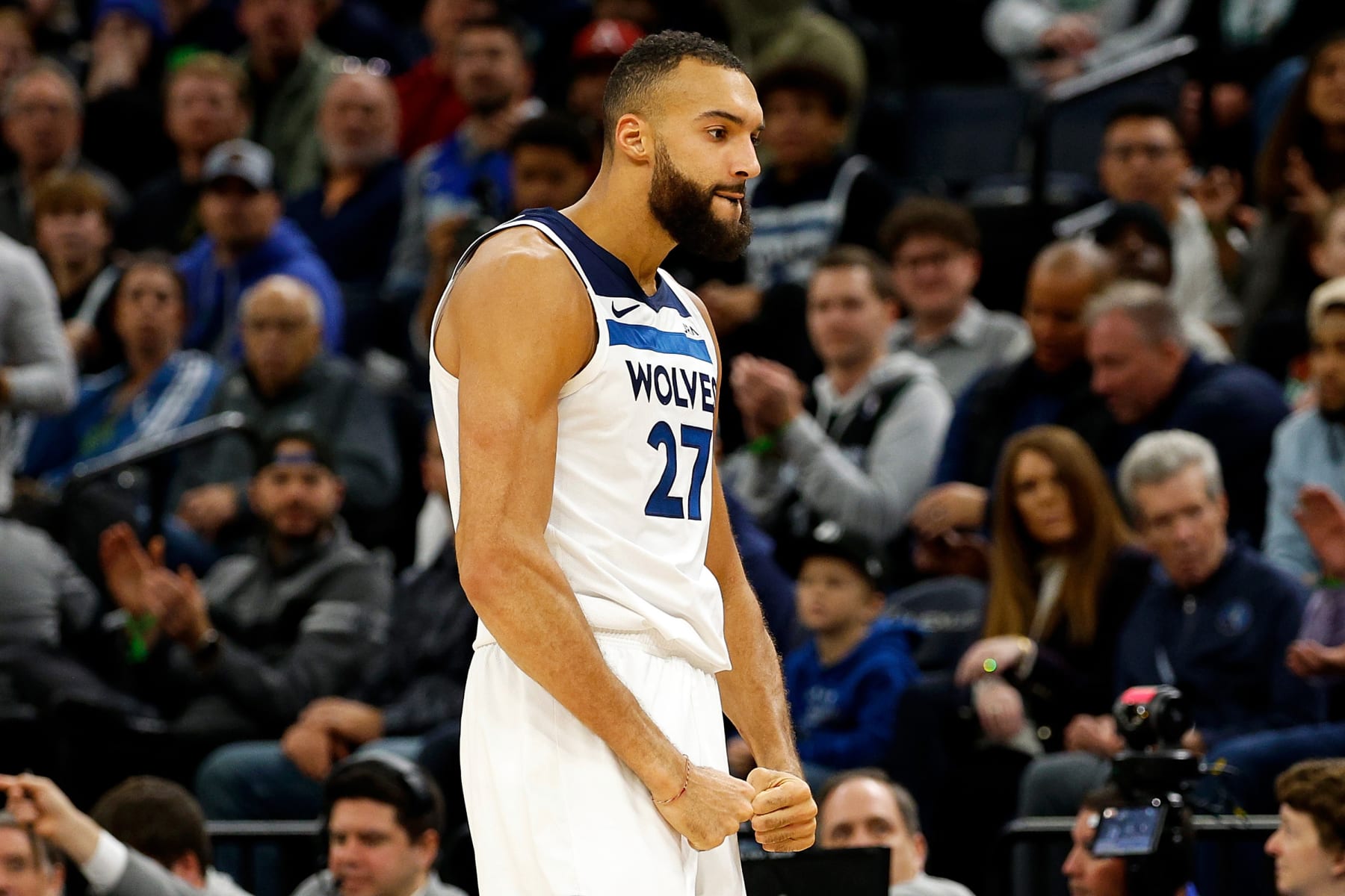 MINNEAPOLIS, MINNESOTA - NOVEMBER 06: Rudy Gobert #27 of the Minnesota Timberwolves celebrates forcing a turnover against the Boston Celtics in the fourth quarter at Target Center on November 06, 2023 in Minneapolis, Minnesota. The Timberwolves defeated the Celtics 114-109 in overtime. NOTE TO USER: User expressly acknowledges and agrees that, by downloading and or using this photograph, User is consenting to the terms and conditions of the Getty Images License Agreement. (Photo by David Berding/Getty Images)