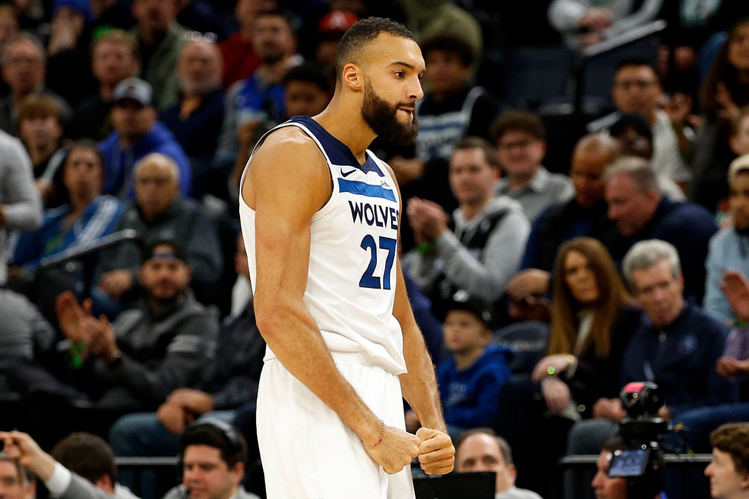 MINNEAPOLIS, MINNESOTA - NOVEMBER 06: Rudy Gobert #27 of the Minnesota Timberwolves celebrates forcing a turnover against the Boston Celtics in the fourth quarter at Target Center on November 06, 2023 in Minneapolis, Minnesota. The Timberwolves defeated the Celtics 114-109 in overtime. NOTE TO USER: User expressly acknowledges and agrees that, by downloading and or using this photograph, User is consenting to the terms and conditions of the Getty Images License Agreement. (Photo by David Berding/Getty Images)