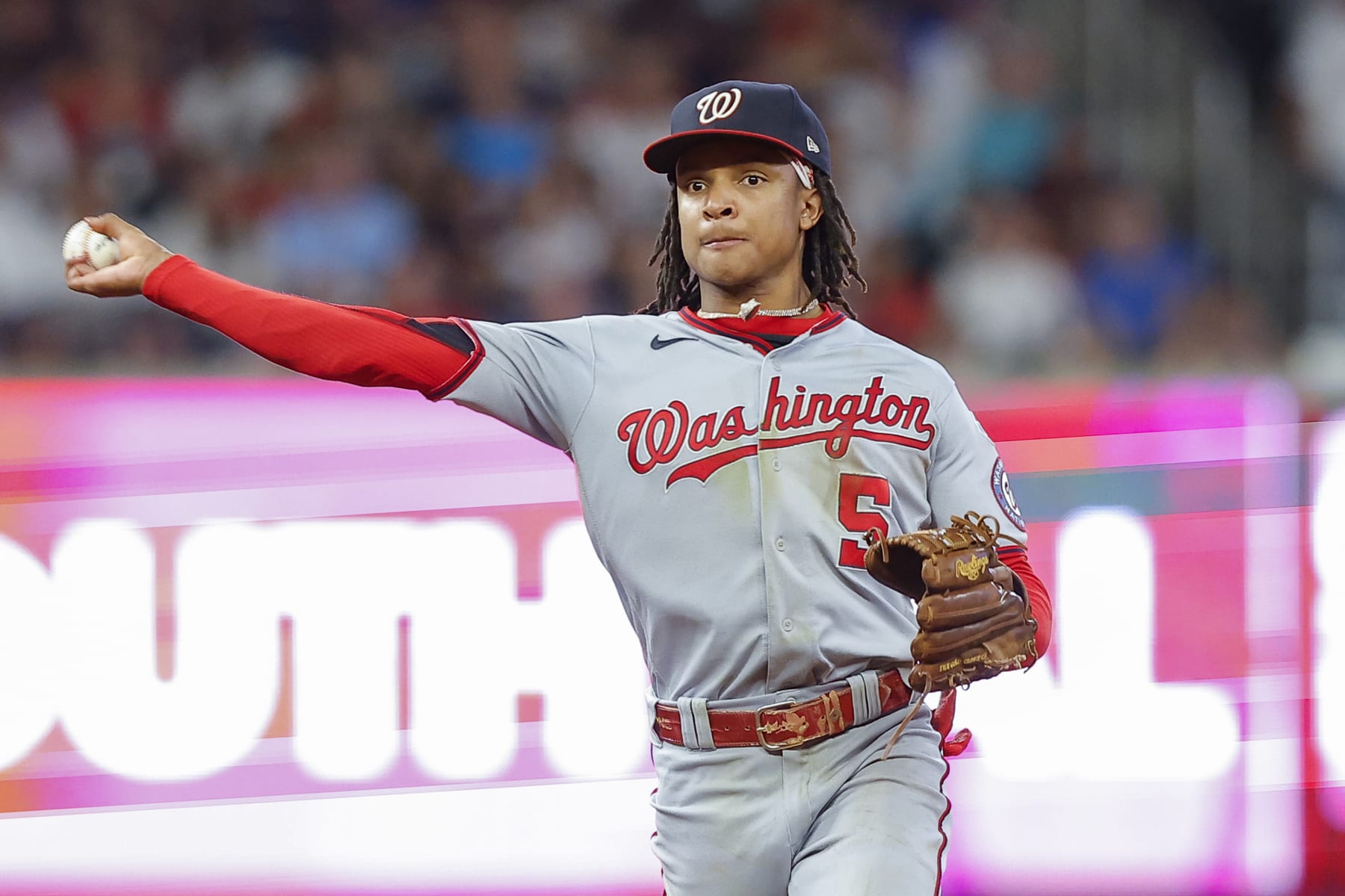 ATLANTA, GEORGIA - SEPTEMBER 29: CJ Abrams #5 of the Washington Nationals throws to first during the third inning against the Atlanta Braves at Truist Park on September 29, 2023 in Atlanta, Georgia. (Photo by Todd Kirkland/Getty Images)