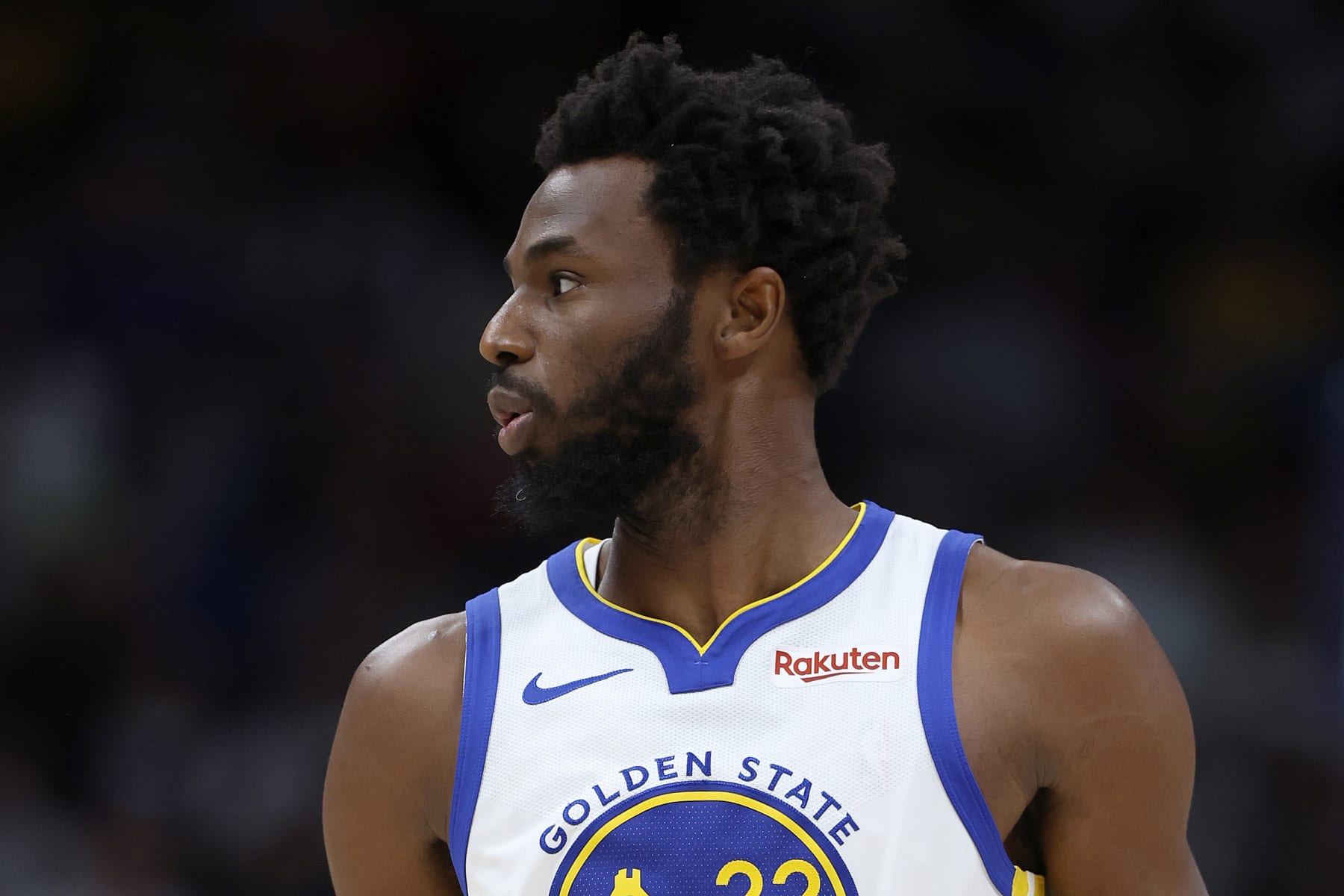 DENVER, COLORADO - NOVEMBER 08: Andrew Wiggins #22 of the Golden State Warriors plays the Denver Nuggets in the first quarter at Ball Arena on November 08, 2023 in Denver, Colorado. NOTE TO USER: User expressly acknowledges and agrees that, by downloading and or using this photograph, User is consenting to the terms and conditions of the Getty Images License Agreement.  (Photo by Matthew Stockman/Getty Images)