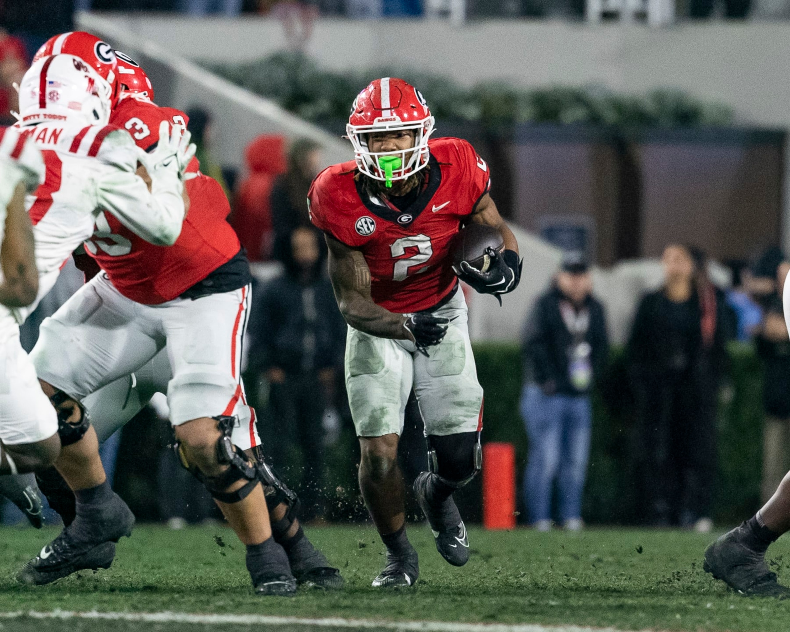 ATHENS, GA - NOVEMBER 11: Kendall Milton #2 of the Georgia Bulldogs runs with the ball during a game between University of Mississippi and University of Georgia at Sanford Stadium on November 11, 2023 in Athens, Georgia. (Photo by Steve Limentani/ISI Photos/Getty Images)