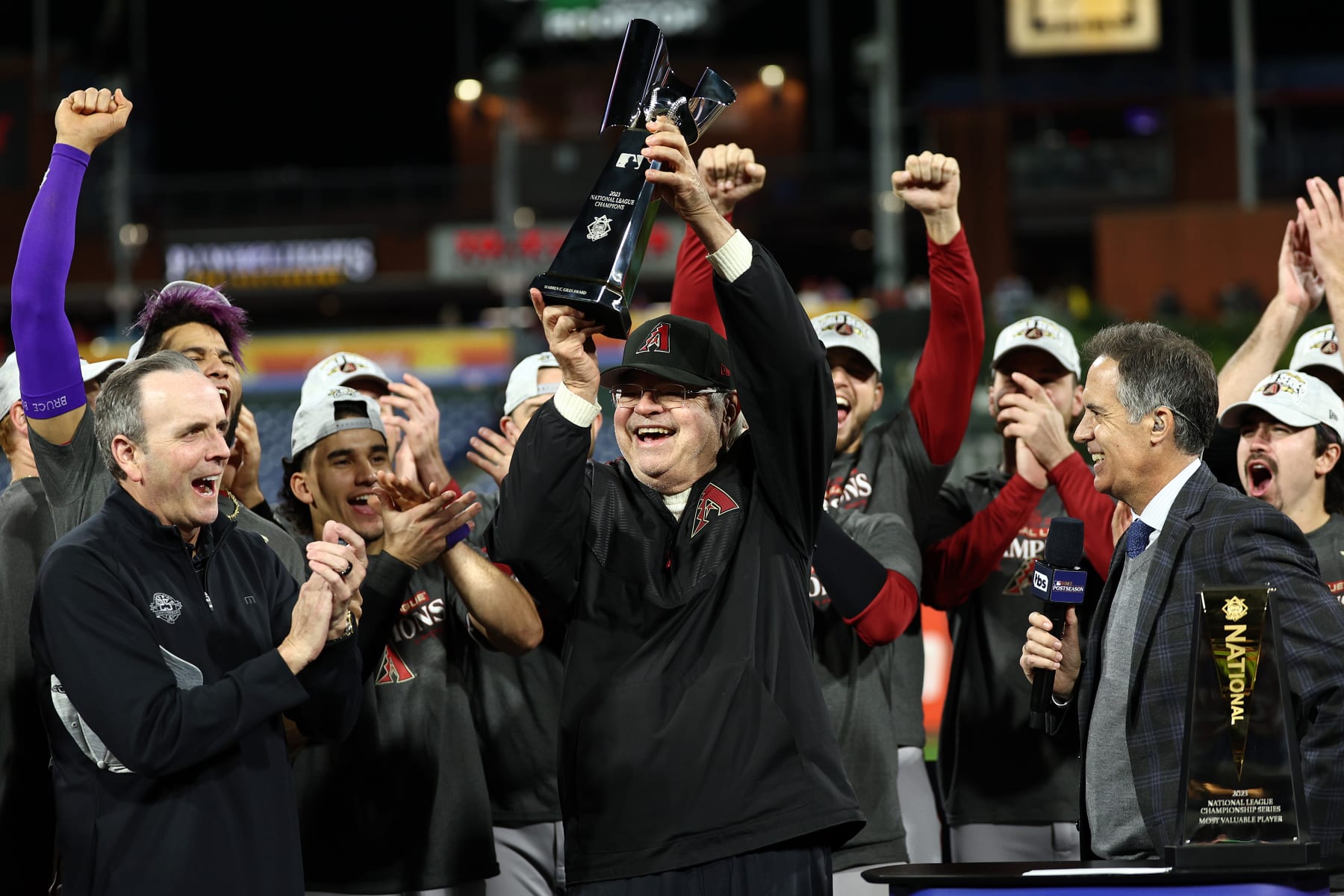 PHILADELPHIA, PENNSYLVANIA - OCTOBER 24: Owner Ken Kendrick of the Arizona Diamondbacks celebrates with the Warren C. Giles Trophy, given to the champion of the National League, after beating Philadelphia Phillies 4-2 in Game Seven of the Championship Series at Citizens Bank Park on October 24, 2023 in Philadelphia, Pennsylvania. (Photo by Elsa/Getty Images)