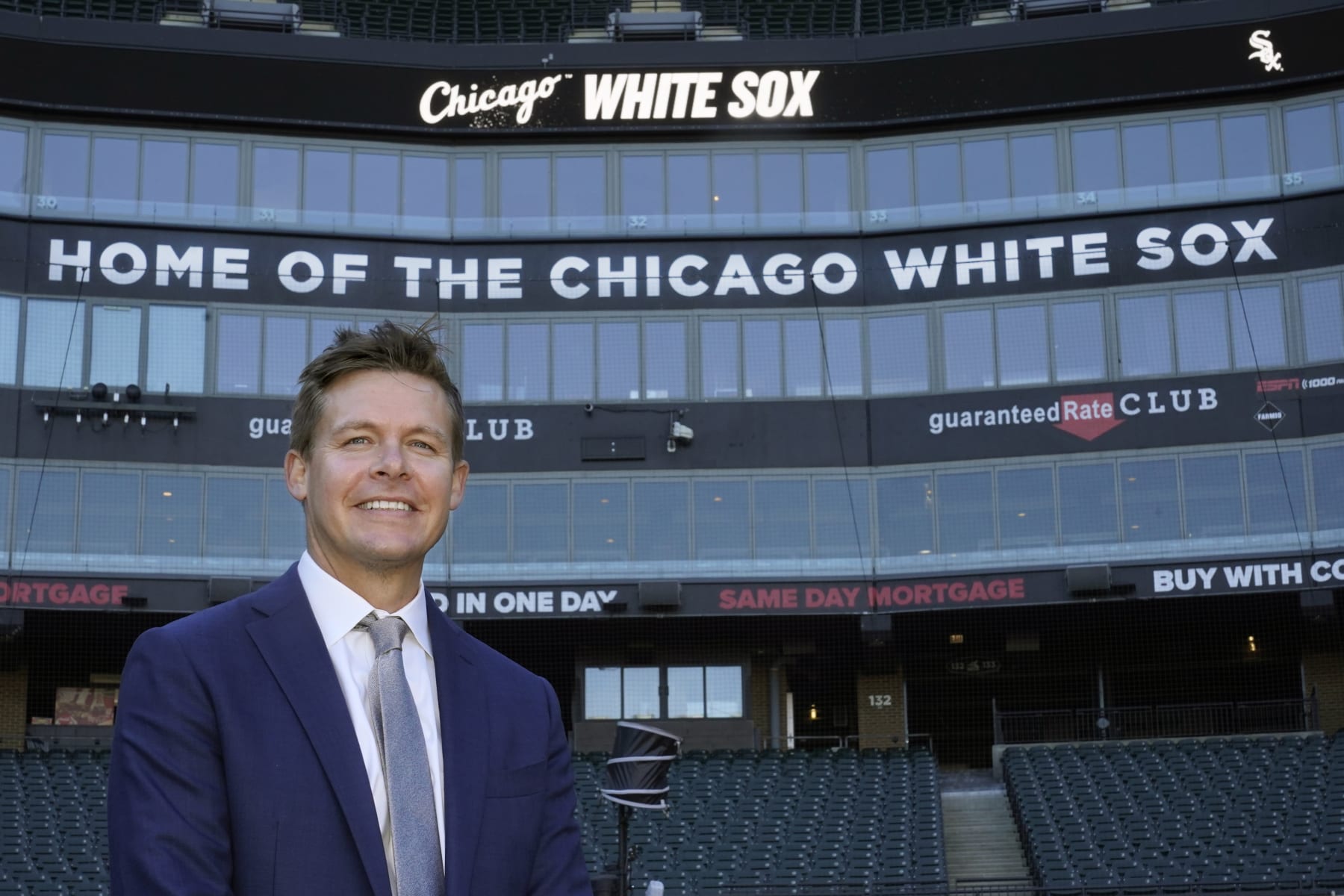 Chris Getz, newly named senior vice president/general manager of the Chicago White Sox, stands for a portrait on Guaranteed Rate Field after a baseball news conference Thursday, Aug. 31, 2023, in Chicago. Getz, a former player and front office executive with the Kansas City Royals and the White Sox, is in his seventh season with the Sox baseball operations department, including the last three as assistant general manager. (AP Photo/Charles Rex Arbogast)