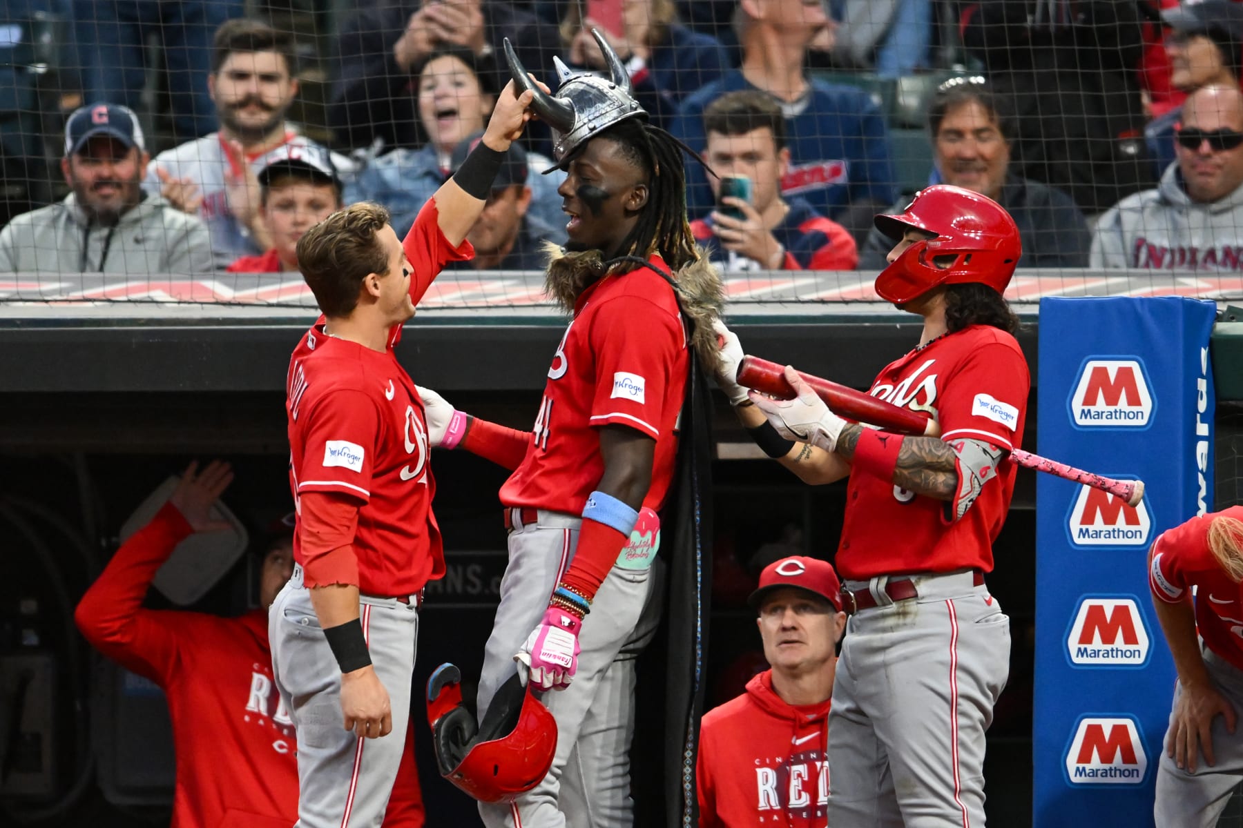 CLEVELAND, OHIO - SEPTEMBER 26, 2023: TJ Friedl #29, Jonathan India #6 and Elly De La Cruz #44 of the Cincinnati Reds celebrate a solo home run hit by De La Cruz during the fourth inning against the Cleveland Guardians at Progressive Field on September 26, 2023 in Cleveland, Ohio. (Photo by Nick Cammett/Diamond Images via Getty Images)