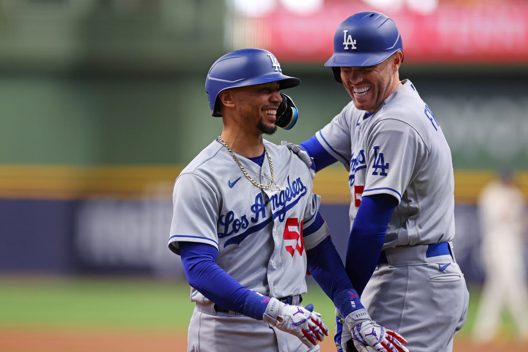 MILWAUKEE, WISCONSIN - MAY 09: Mookie Betts #50 of the Los Angeles Dodgers is congratulated by Freddie Freeman #5 following a home run against the Milwaukee Brewers during the first inning at American Family Field on May 09, 2023 in Milwaukee, Wisconsin. (Photo by Stacy Revere/Getty Images)