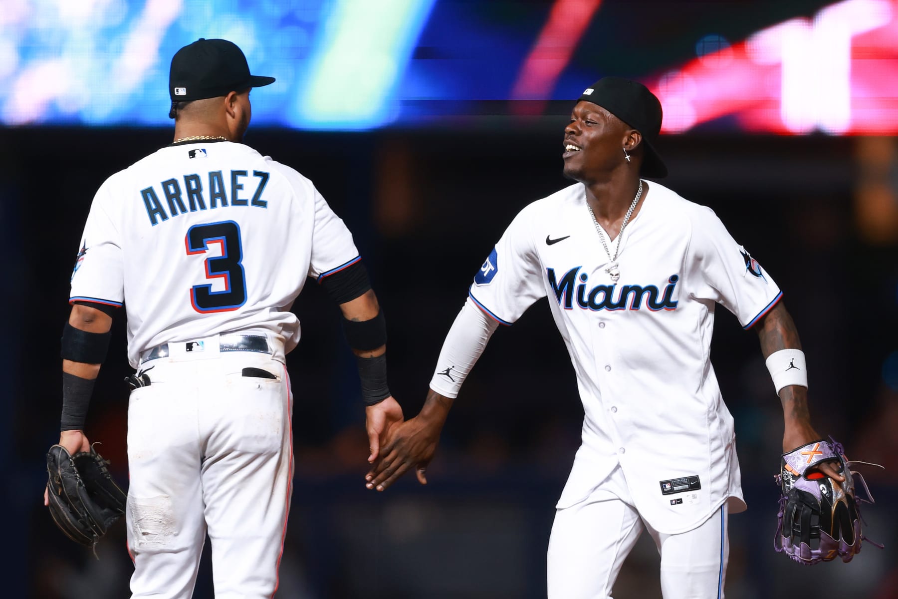 MIAMI, FLORIDA - AUGUST 14: Luis Arraez #3 and Jazz Chisholm Jr. #2 of the Miami Marlins celebrate after defeating the Houston Astros at loanDepot park on August 14, 2023 in Miami, Florida. (Photo by Megan Briggs/Getty Images)