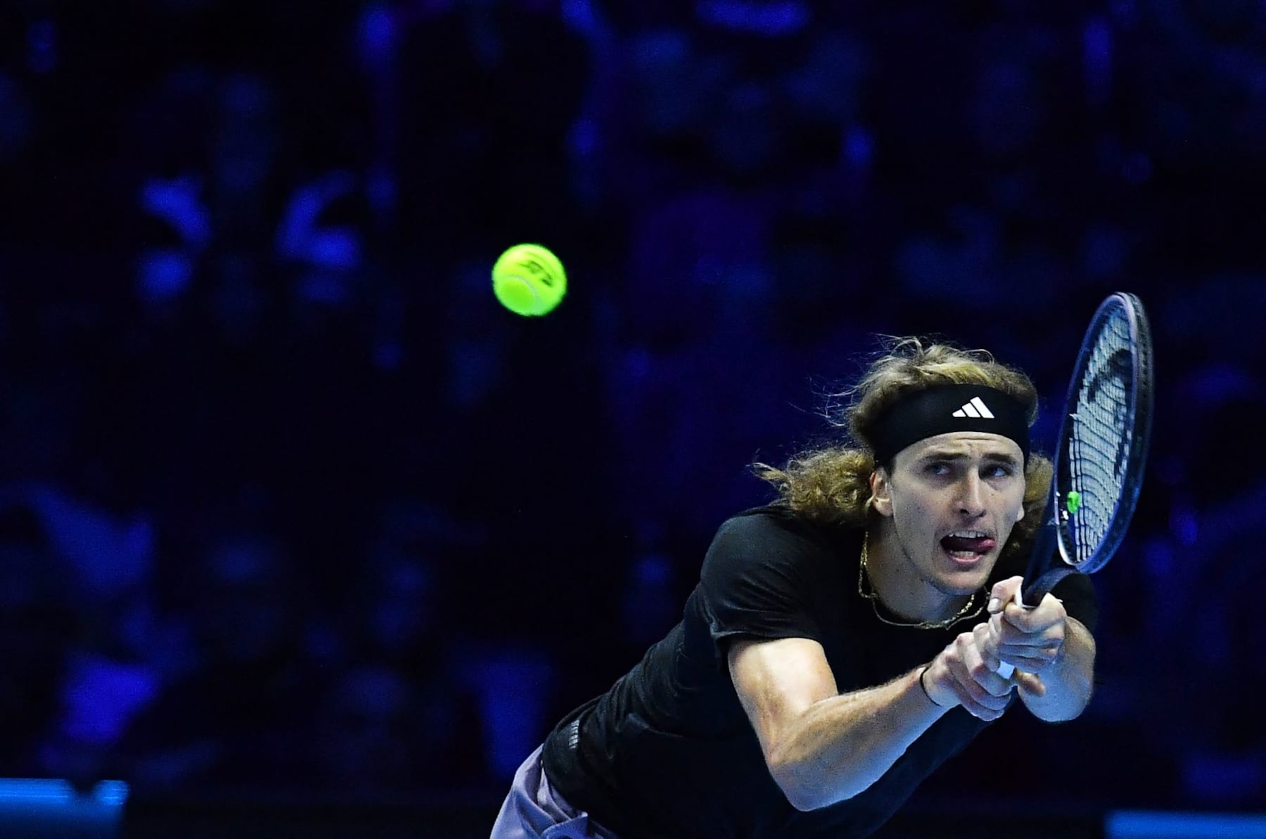 Germany's Alexander Zverev returns to Spain's Carlos Alcaraz during their first round-robin match at the ATP Finals tennis tournament in Turin on November 13, 2023. (Photo by Tiziana FABI / AFP) (Photo by TIZIANA FABI/AFP via Getty Images)