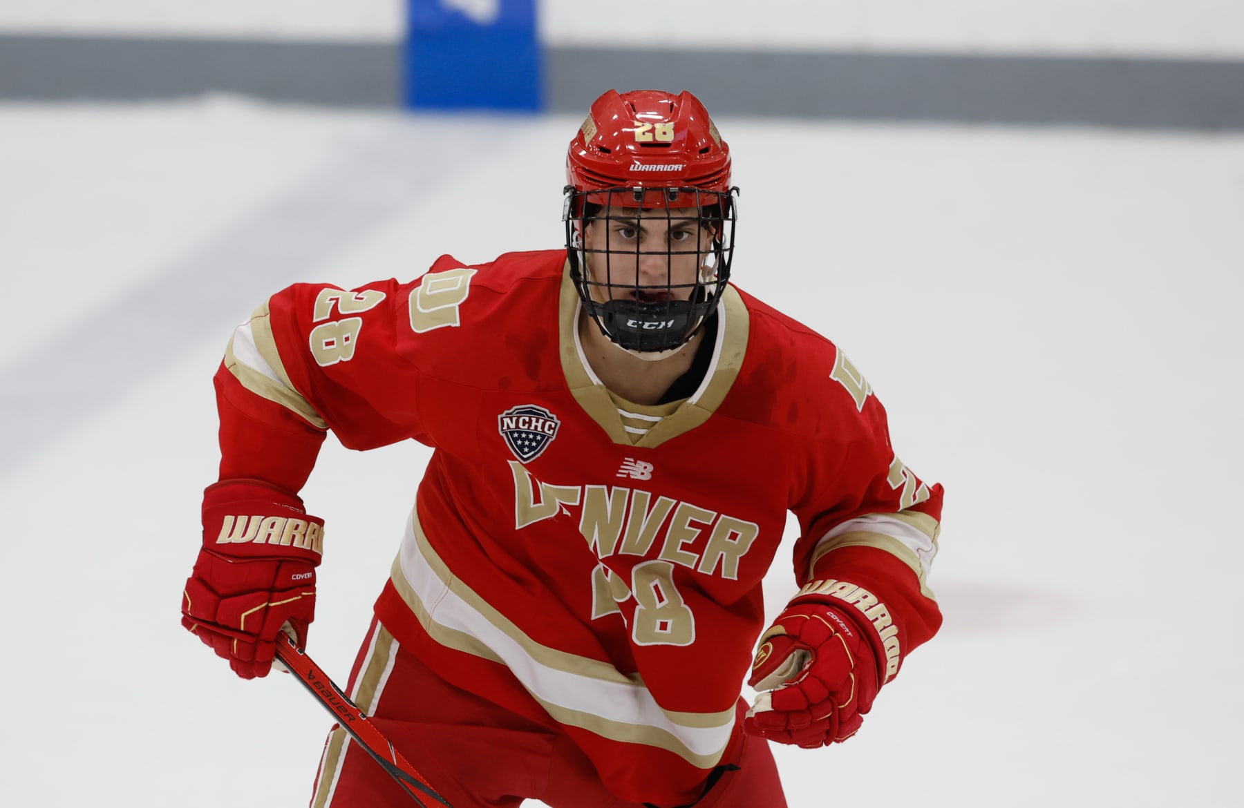 PROVIDENCE, RHODE ISLAND - OCTOBER 20: Zeev Buium #28 of the Denver Pioneers skates against the Providence College Friars during NCAA hockey at the Schneider Arena on October 20, 2023 in Providence, Rhode Island. The Friars won 4-3. (Photo by Richard T Gagnon/Getty Images)