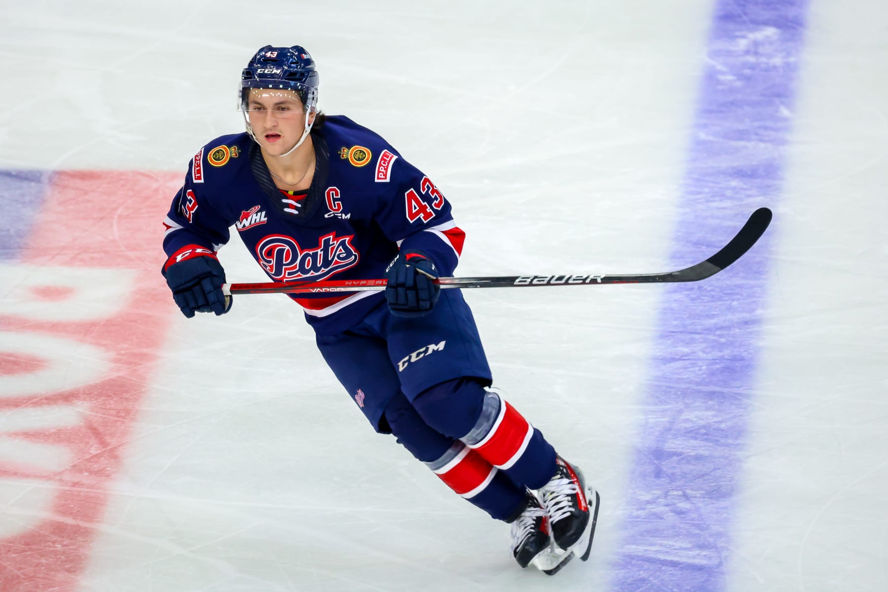 BRANDON, CANADA - SEPTEMBER 22: Tanner Howe #43 of the Regina Pats skates during first period action against the Brandon Wheat Kings at Westoba Place on September 22, 2023 in Brandon, Manitoba, Canada. (Photo by Jonathan Kozub/Getty Images)