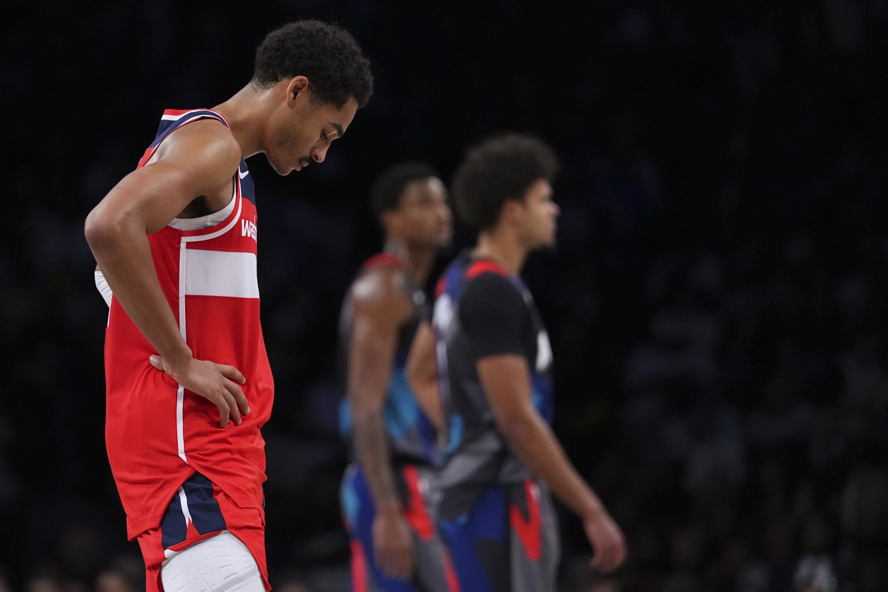 NEW YORK, NEW YORK - NOVEMBER 12: Jordan Poole #13 of the Washington Wizards looks down in the second half of the game against the Brooklyn Nets at Barclays Center on November 12, 2023 in the Brooklyn borough of New York City. The Nets defeated the Wizards 102-94. NOTE TO USER: User expressly acknowledges and agrees that, by downloading and or using this photograph, User is consenting to the terms and conditions of the Getty Images License Agreement. (Photo by Mitchell Leff/Getty Images)