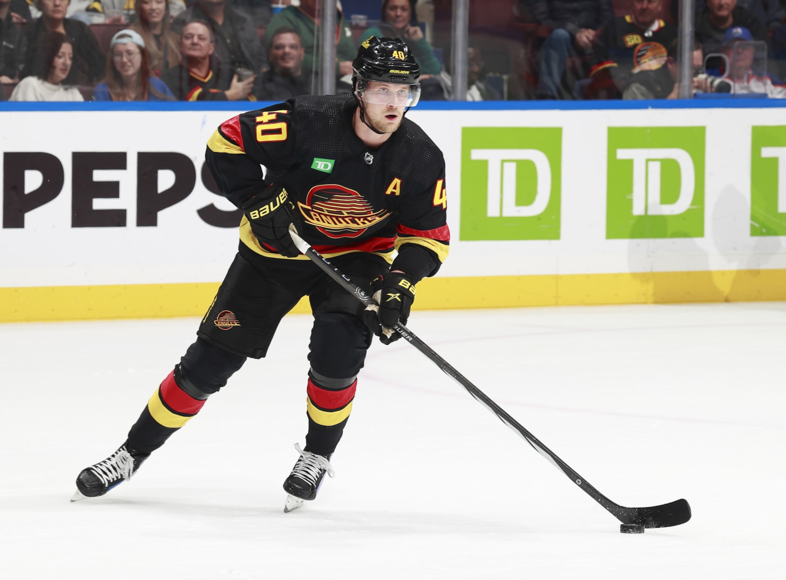 VANCOUVER, CANADA - NOVEMBER 6: Elias Pettersson #40 of the Vancouver Canucks skates up ice during their NHL game against the Edmonton Oilers at Rogers Arena on November 6, 2023 in Vancouver, British Columbia, Canada. (Photo by Jeff Vinnick/NHLI via Getty Images) VANCOUVER, CANADA - NOVEMBER 6: Elias Pettersson #40 of the Vancouver Canucks skates up ice during their NHL game against the Edmonton Oilers at Rogers Arena on November 6, 2023 in Vancouver, British Columbia, Canada. (Photo by Jeff Vinnick/NHLI via Getty Images)