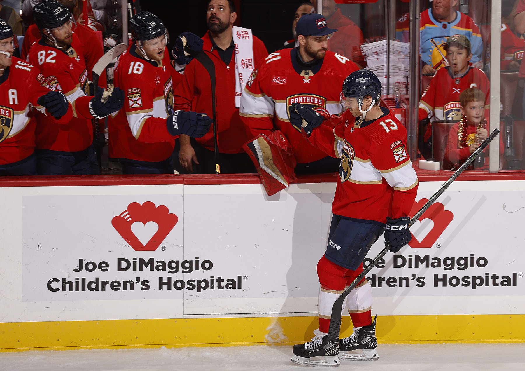 SUNRISE, FLORIDA - NOVEMBER 12: Sam Reinhart #13 of the Florida Panthers celebrates his goal with teammates during the second period against the Chicago Blackhawks at the Amerant Bank Arena on November 12, 2023 in Sunrise, Florida. (Photo by Eliot J. Schechter/NHLI via Getty Images)