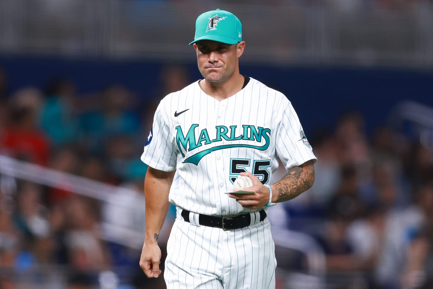 MIAMI, FLORIDA - JULY 28: Manager Skip Schumaker #55 of the Miami Marlins looks on during the eighth inning of the game against the Detroit Tigers at loanDepot park on July 28, 2023 in Miami, Florida. (Photo by Megan Briggs/Getty Images)