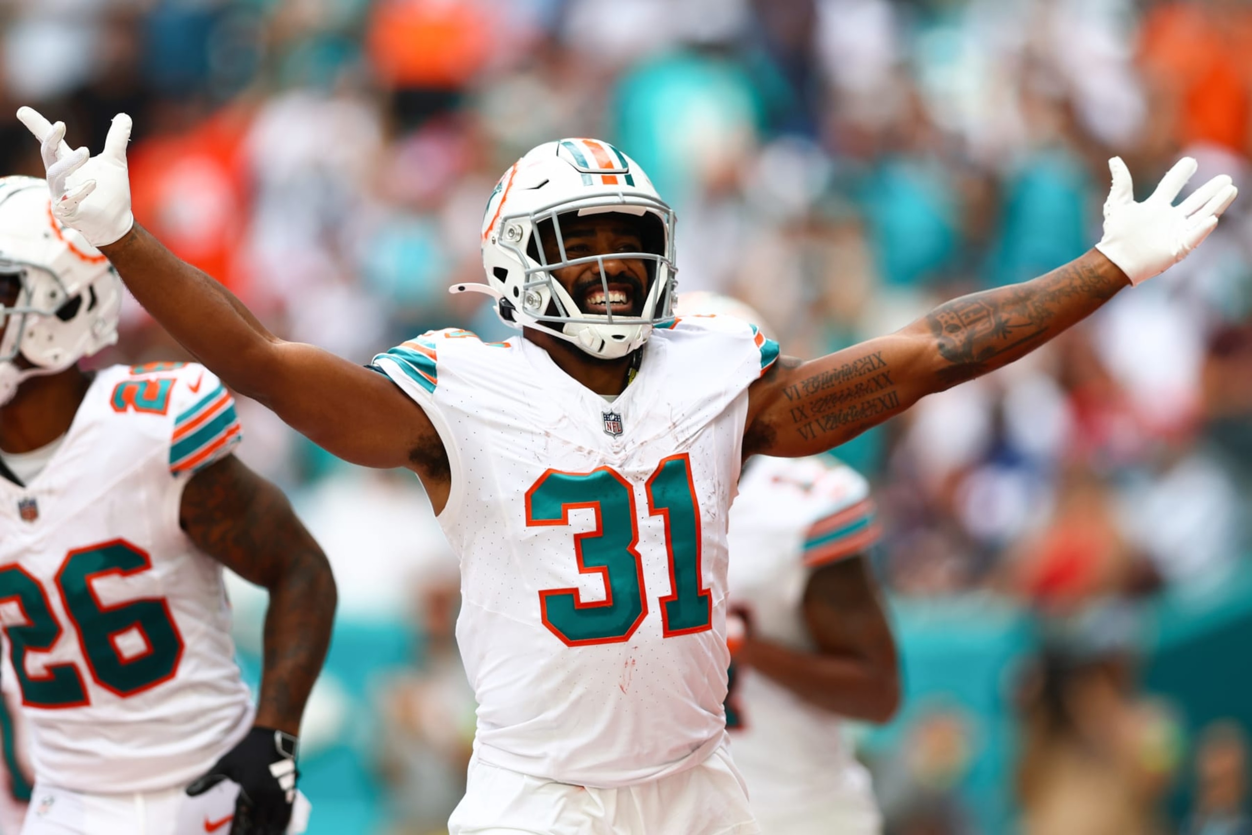 MIAMI GARDENS, FLORIDA - OCTOBER 29: Raheem Mostert #31 of the Miami Dolphins celebrates after his rushing touchdown during the third quarter against the New England Patriots at Hard Rock Stadium on October 29, 2023 in Miami Gardens, Florida. (Photo by Megan Briggs/Getty Images)