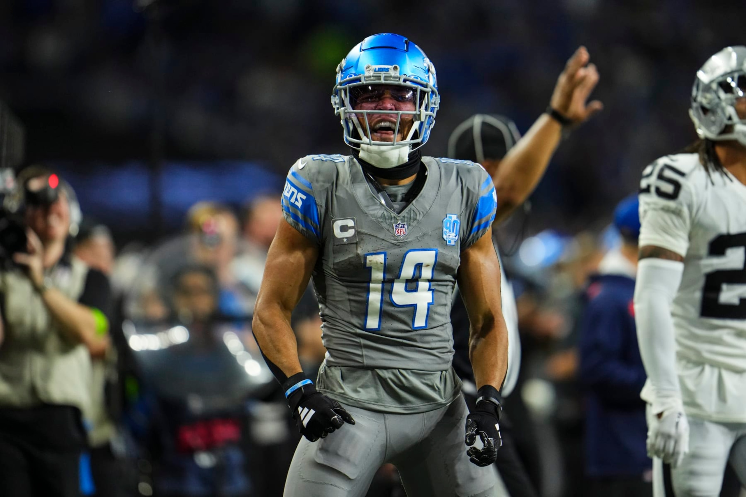 DETROIT, MI - OCTOBER 30: Amon-Ra St. Brown #14 of the Detroit Lions celebrates during an NFL game against the Las Vegas Raiders at Ford Field on October 30, 2023 in Detroit, Michigan. (Photo by Cooper Neill/Getty Images)