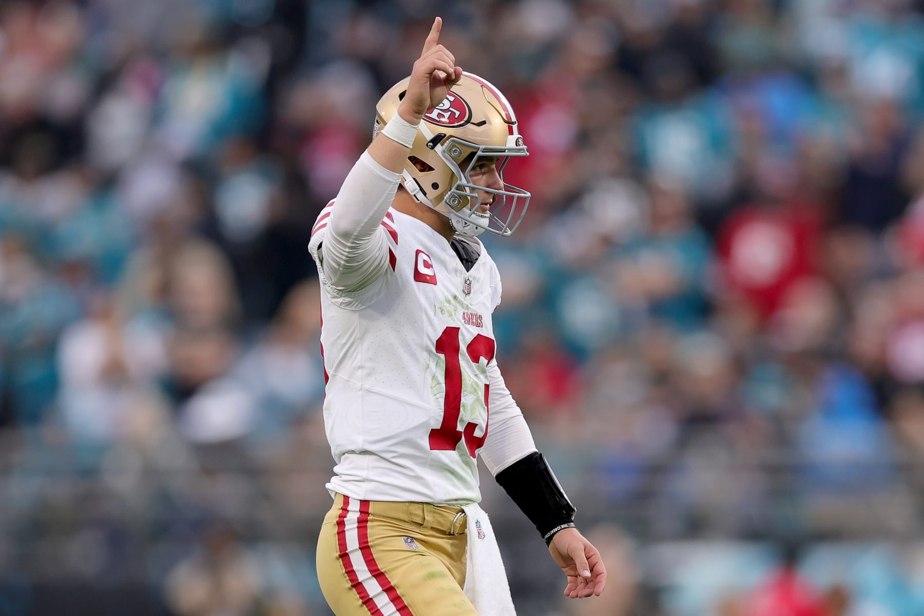 JACKSONVILLE, FLORIDA - NOVEMBER 12: Brock Purdy #13 of the San Francisco 49ers reacts after a touchdown pass during the third quarter against the Jacksonville Jaguars at EverBank Stadium on November 12, 2023 in Jacksonville, Florida. (Photo by Megan Briggs/Getty Images)