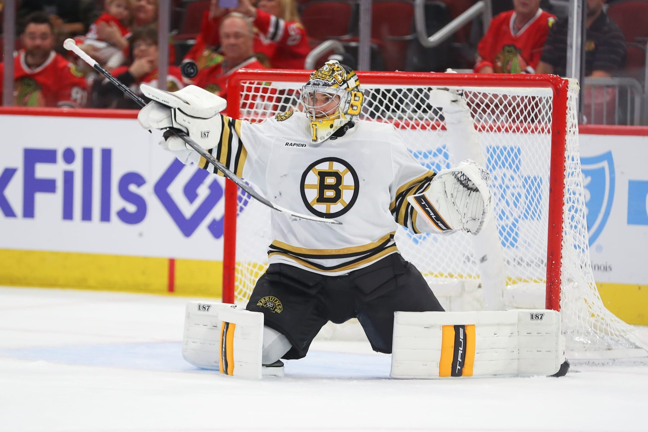 CHICAGO, IL - OCTOBER 24: Boston Bruins goaltender Jeremy Swayman (1) makes a save during a game between the Boston Bruins and the Chicago Blackhawks on October 24, 2023 at the United Center in Chicago, IL. (Photo by Melissa Tamez/Icon Sportswire via Getty Images)
