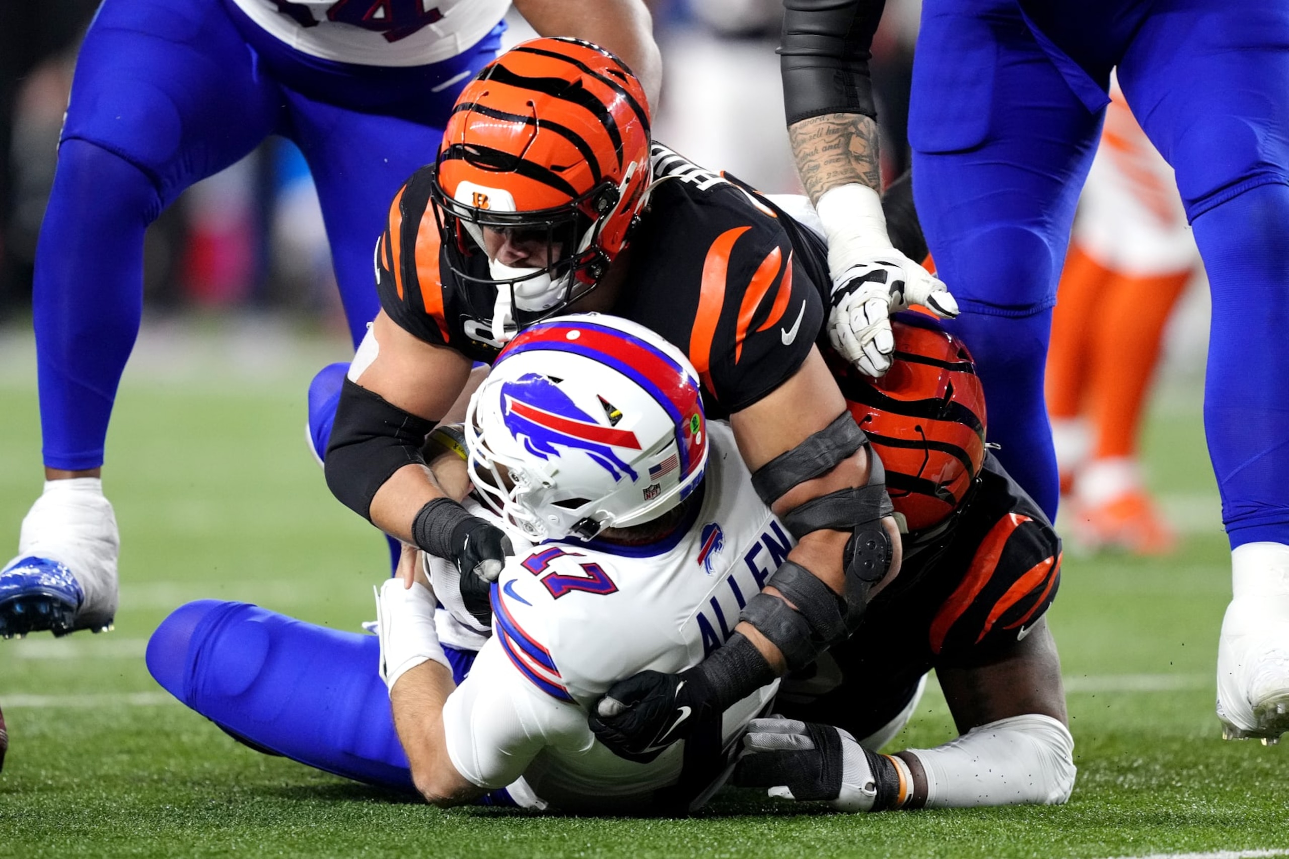 CINCINNATI, OHIO - NOVEMBER 05:  Josh Allen #17 of the Buffalo Bills is sacked by BJ Hill #92 of the Cincinnati Bengals during the second quarter at Paycor Stadium on November 05, 2023 in Cincinnati, Ohio. (Photo by Dylan Buell/Getty Images)