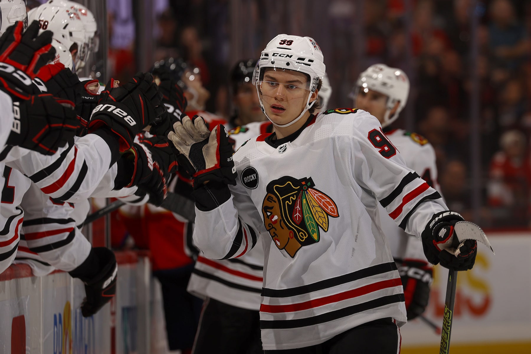 SUNRISE, FLORIDA - NOVEMBER 12: Connor Bedard #98 of the Chicago Blackhawks celebrates his goal with teammates during the first period against the Florida Panthers at the Amerant Bank Arena on November 12, 2023 in Sunrise, Florida. (Photo by Eliot J. Schechter/NHLI via Getty Images)