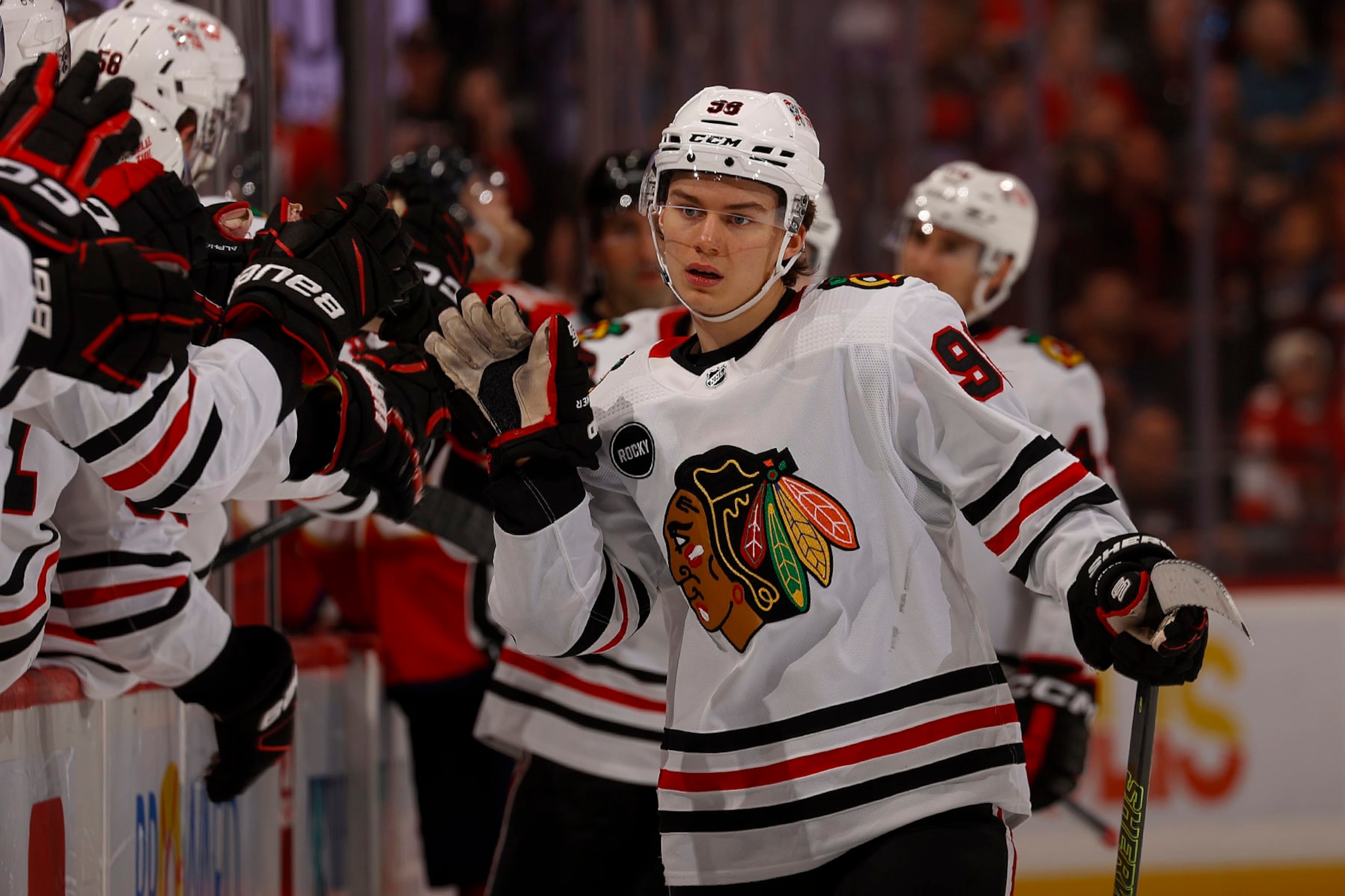 SUNRISE, FLORIDA - NOVEMBER 12: Connor Bedard #98 of the Chicago Blackhawks celebrates his goal with teammates during the first period against the Florida Panthers at the Amerant Bank Arena on November 12, 2023 in Sunrise, Florida. (Photo by Eliot J. Schechter/NHLI via Getty Images) SUNRISE, FLORIDA - NOVEMBER 12: Connor Bedard #98 of the Chicago Blackhawks celebrates his goal with teammates during the first period against the Florida Panthers at the Amerant Bank Arena on November 12, 2023 in Sunrise, Florida. (Photo by Eliot J. Schechter/NHLI via Getty Images)