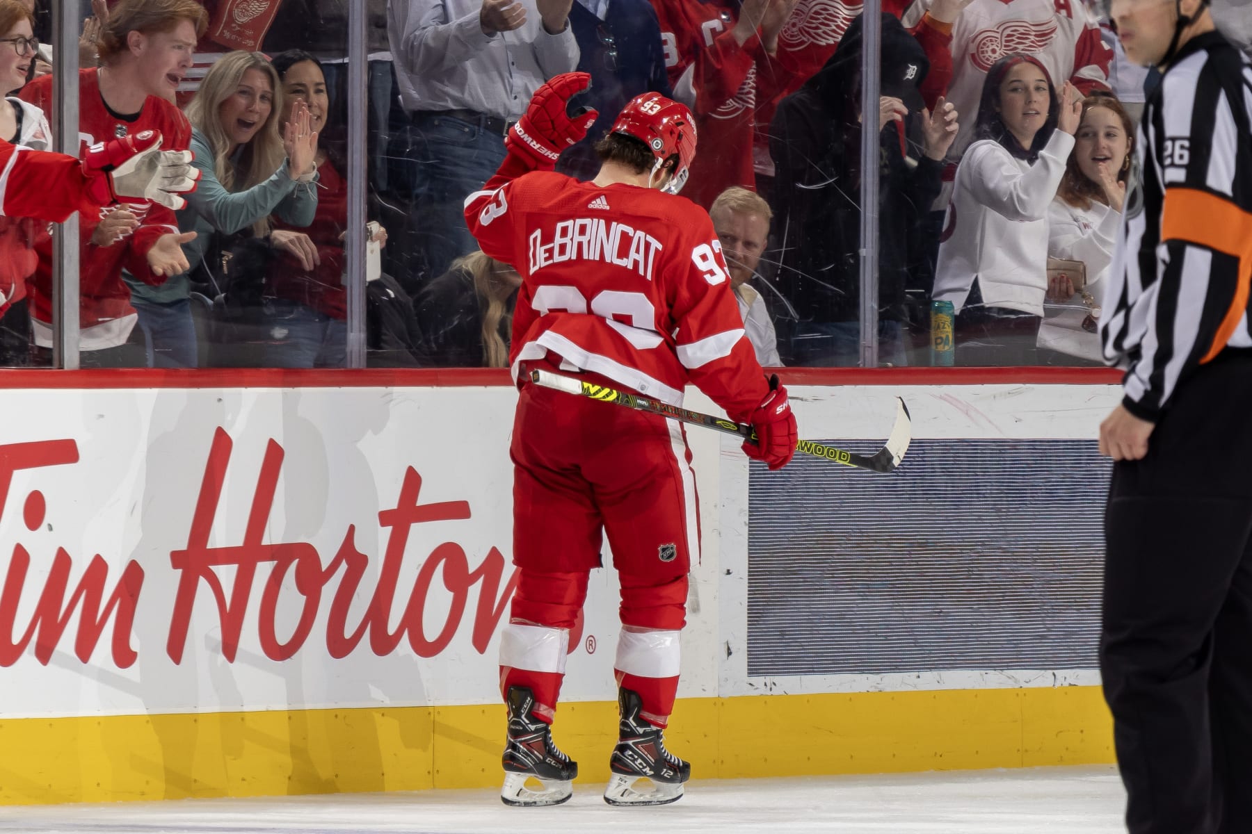 DETROIT, MI - OCTOBER 24: Alex DeBrincat #93 of the Detroit Red Wings celebrates after scoring goal against the Seattle Kraken during the third period at Little Caesars Arena on October 24, 2023 in Detroit, Michigan. (Photo by Dave Reginek/NHLI via Getty Images)