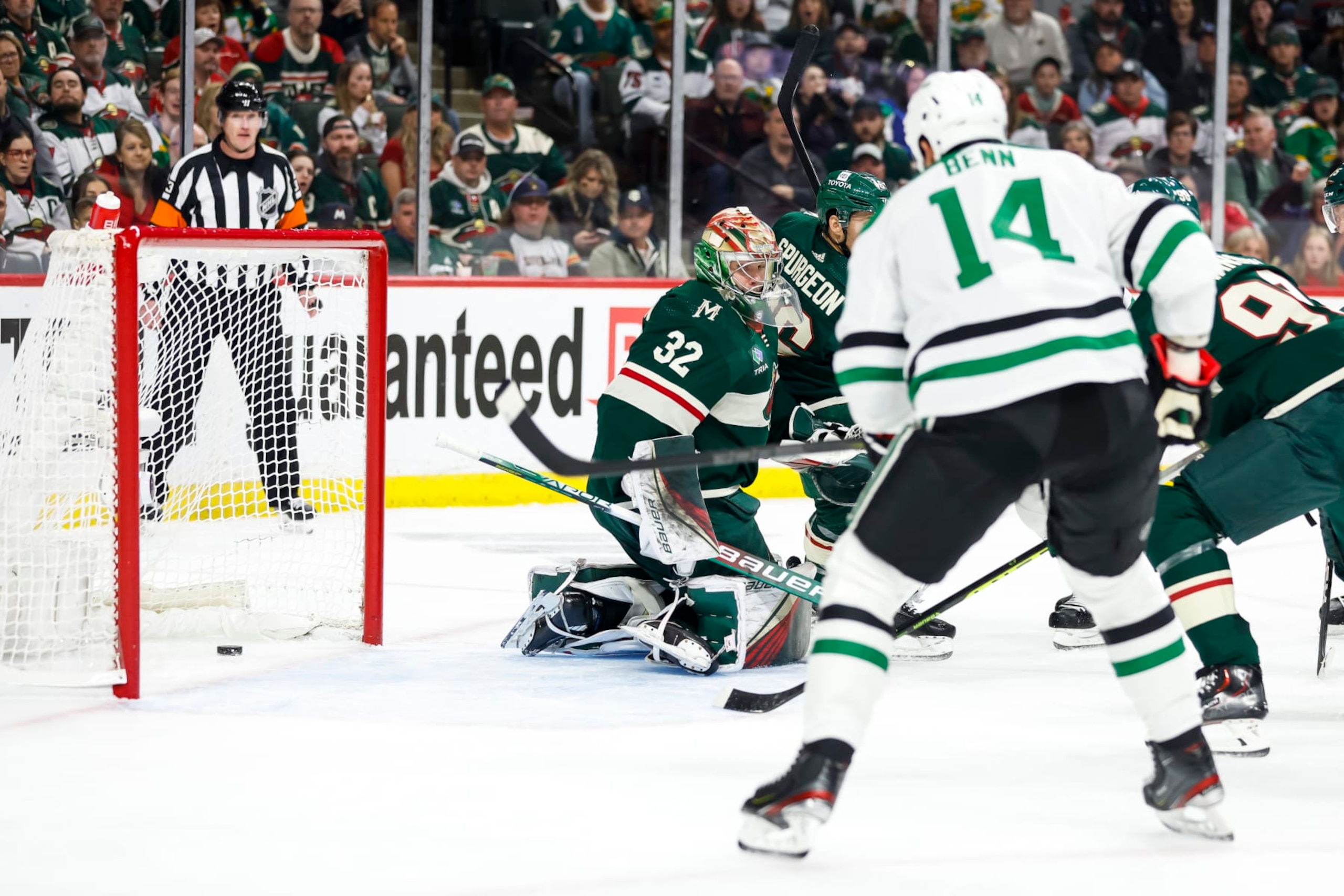 ST PAUL, MN - APRIL 23: A puck shot by Tyler Seguin #91 of the Dallas Stars goes past Filip Gustavsson #32 of the Minnesota Wild for a power-play goal in the second period of Game Four of the First Round of the 2023 Stanley Cup Playoffs at Xcel Energy Center on April 23, 2023 in St Paul, Minnesota. (Photo by David Berding/Getty Images) ST PAUL, MN - APRIL 23: A puck shot by Tyler Seguin #91 of the Dallas Stars goes past Filip Gustavsson #32 of the Minnesota Wild for a power-play goal in the second period of Game Four of the First Round of the 2023 Stanley Cup Playoffs at Xcel Energy Center on April 23, 2023 in St Paul, Minnesota. (Photo by David Berding/Getty Images)
