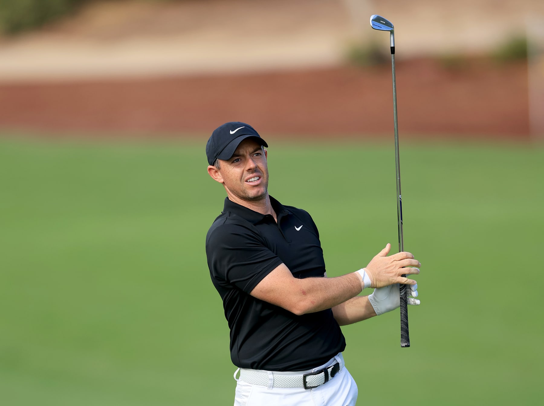 DUBAI, UNITED ARAB EMIRATES - NOVEMBER 14: Rory McIlroy of Northern Ireland plays a shot during the pro-am as a preview for the DP World Tour Championship on the Earth Course at Jumeirah Golf Estates on November 14, 2023 in Dubai, United Arab Emirates. (Photo by David Cannon/Getty Images)
