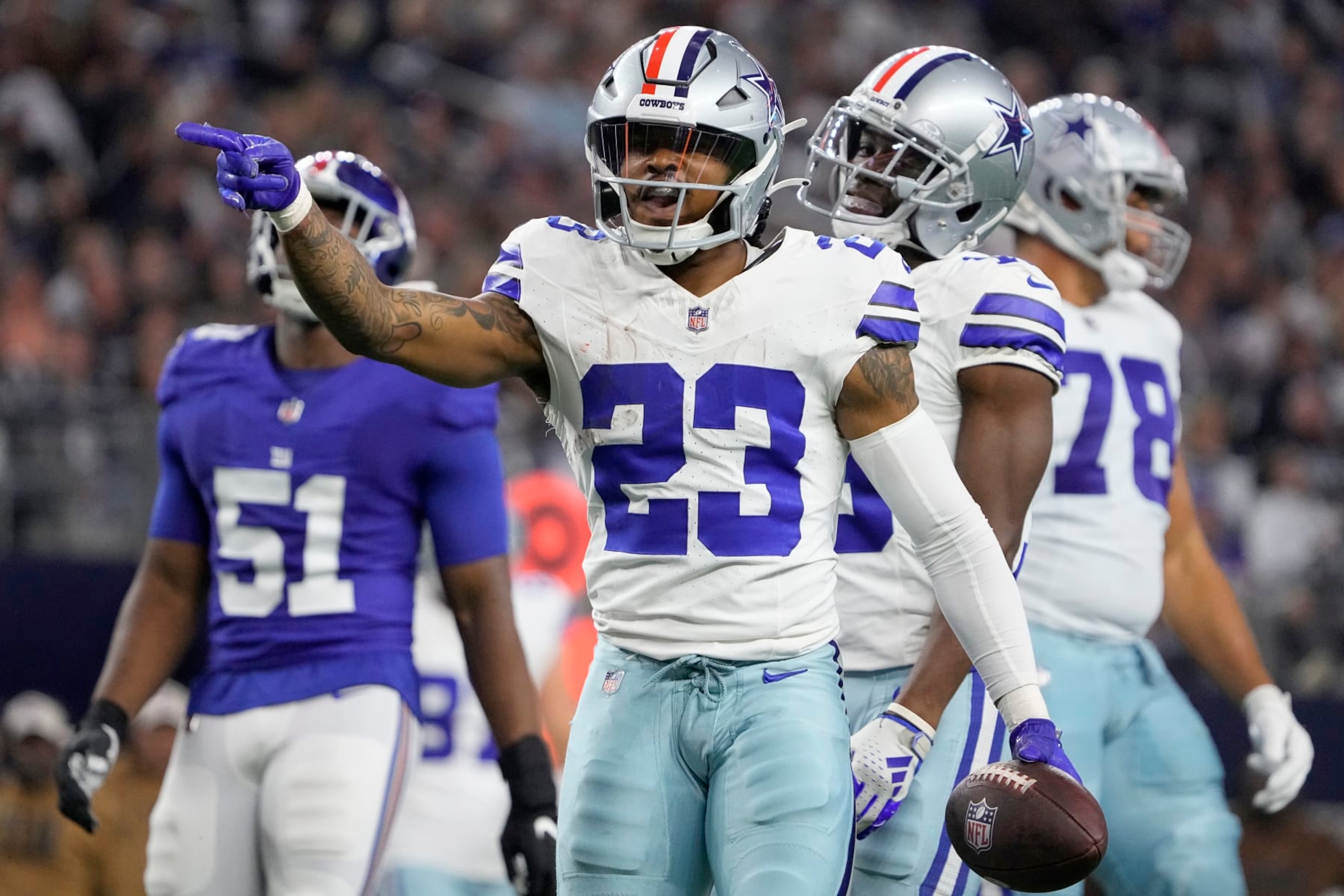 ARLINGTON, TEXAS - NOVEMBER 12: Rico Dowdle #23 of the Dallas Cowboys celebrates after making a first down during the second quarter against the New York Giants at AT&T Stadium on November 12, 2023 in Arlington, Texas. (Photo by Sam Hodde/Getty Images)