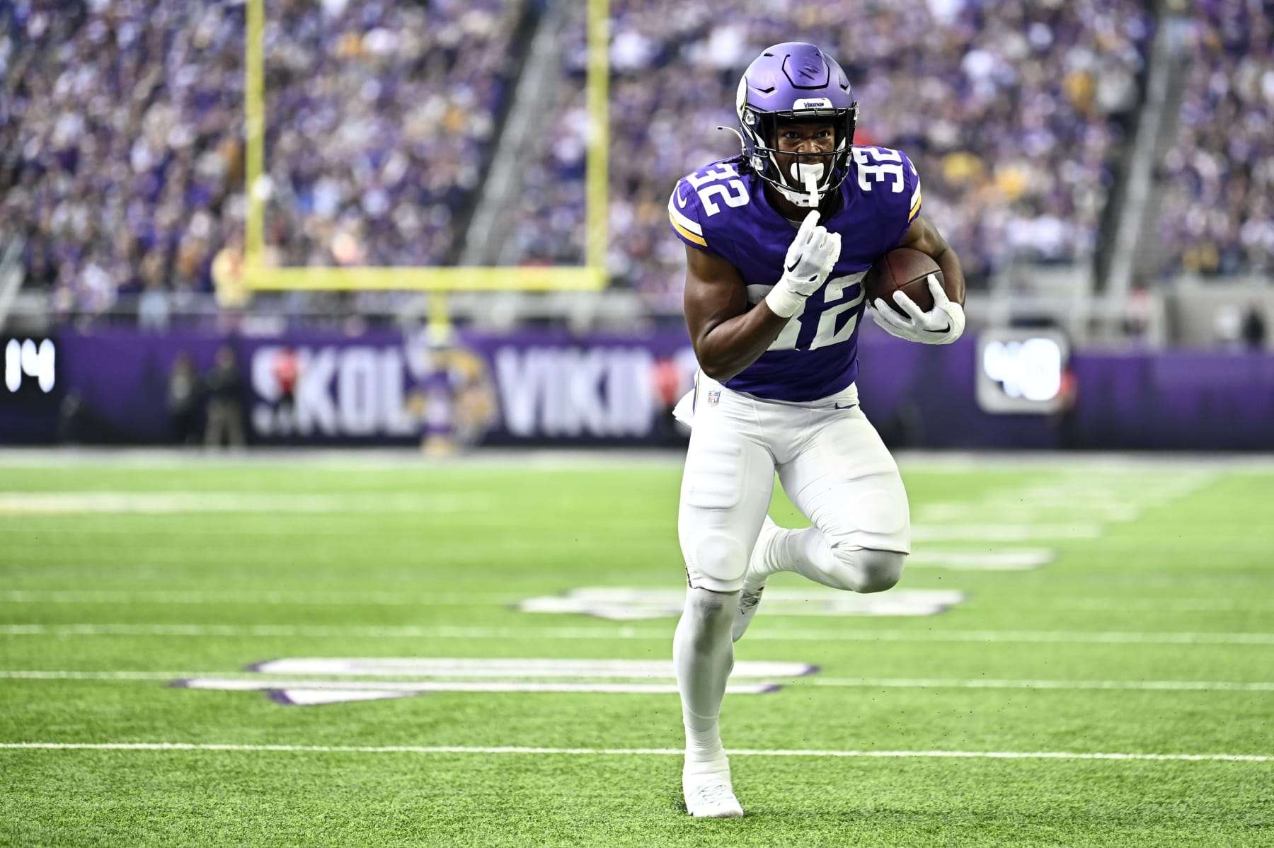MINNEAPOLIS, MINNESOTA - NOVEMBER 12: Ty Chandler #32 of the Minnesota Vikings scores a touchdown against the New Orleans Saints during the second quarter at U.S. Bank Stadium on November 12, 2023 in Minneapolis, Minnesota. (Photo by Stephen Maturen/Getty Images)