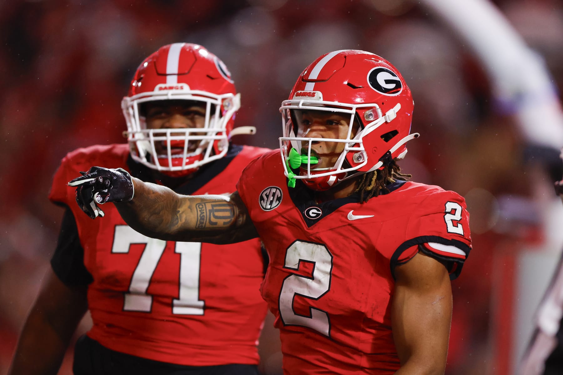 ATHENS, GEORGIA - NOVEMBER 11: Kendall Milton #2 of the Georgia Bulldogs reacts after a long touchdown run during the second half against the Mississippi Rebels at Sanford Stadium on November 11, 2023 in Athens, Georgia. (Photo by Todd Kirkland/Getty Images)