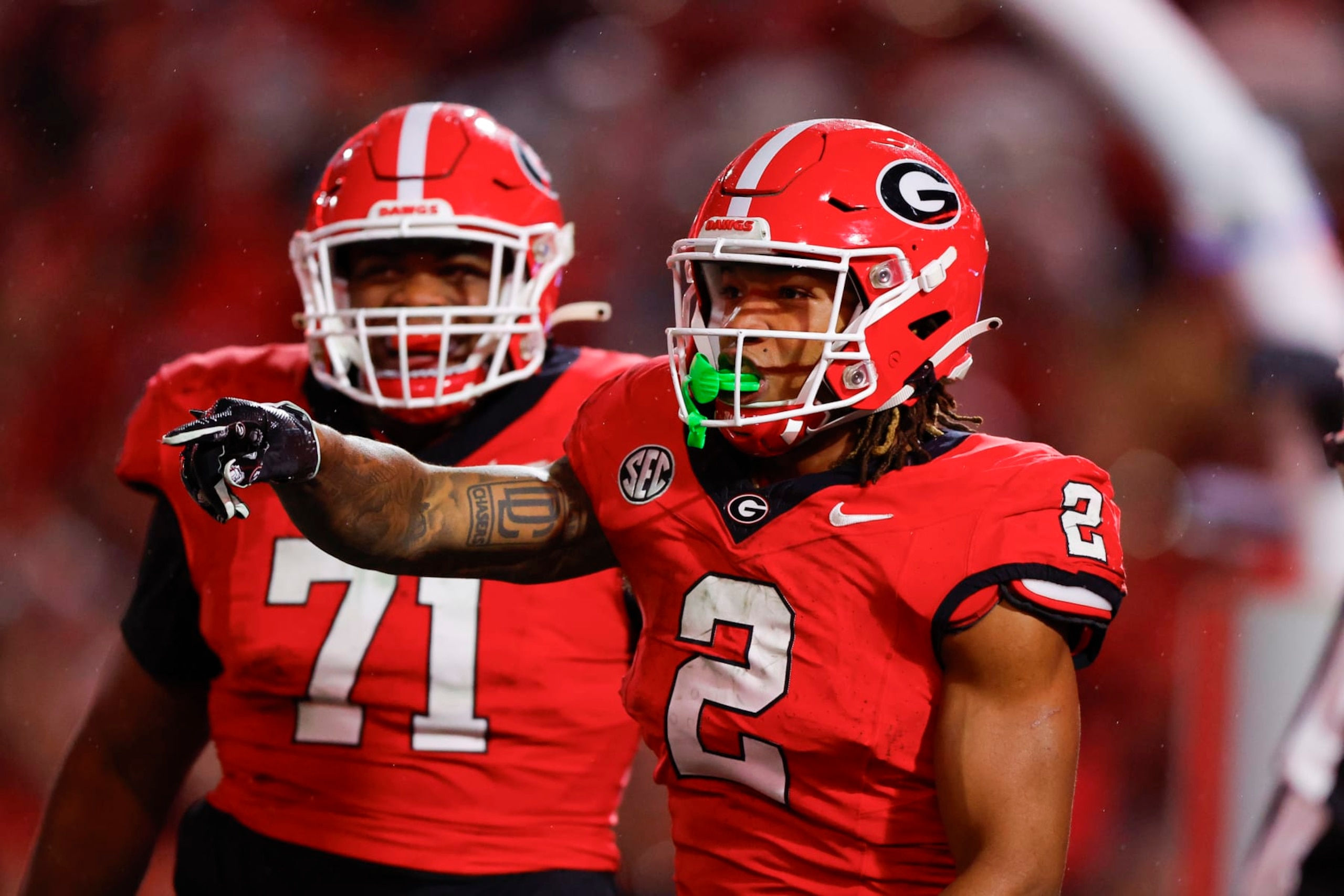 ATHENS, GEORGIA - NOVEMBER 11: Kendall Milton #2 of the Georgia Bulldogs reacts after a long touchdown run during the second half against the Mississippi Rebels at Sanford Stadium on November 11, 2023 in Athens, Georgia. (Photo by Todd Kirkland/Getty Images)