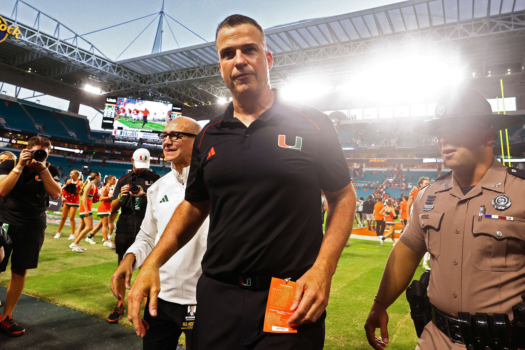 MIAMI GARDENS, FLORIDA - OCTOBER 28: Head coach Mario Cristobal of the Miami Hurricanes walks off the field after defeating the Virginia Cavaliers in overtime at Hard Rock Stadium on October 28, 2023 in Miami Gardens, Florida. (Photo by Megan Briggs/Getty Images)