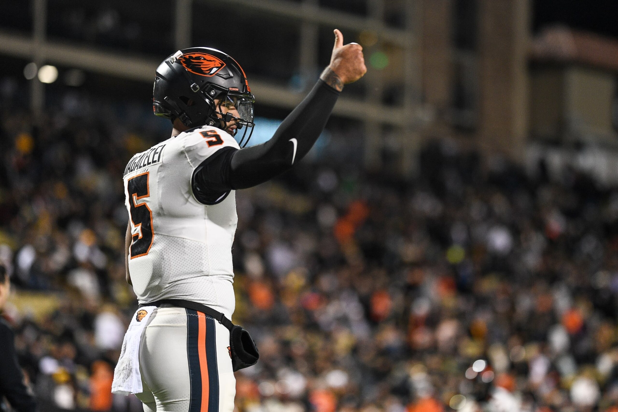 BOULDER, CO - NOVEMBER 4:  Quarterback DJ Uiagalelei #5 of the Oregon State Beavers warms up before a game against the Colorado Buffaloes at Folsom Field on November 4, 2023 in Boulder, Colorado. (Photo by Dustin Bradford/Getty Images)