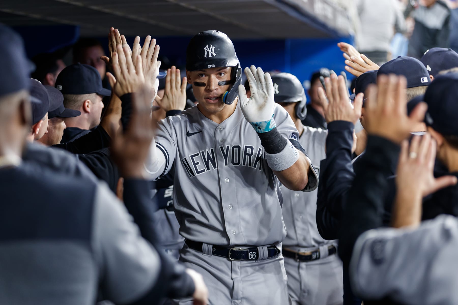 TORONTO, CANADA - SEPTEMBER 27: Aaron Judge #99 of the New York Yankees celebrates a two-run home run in the seventh inning of their MLB game against the Toronto Blue Jays at Rogers Centre on September 27, 2023 in Toronto, Canada. (Photo by Cole Burston/Getty Images)