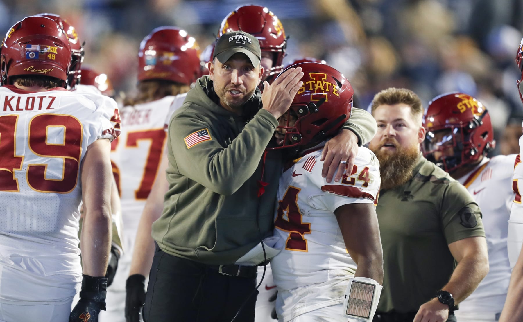 PROVO, UT - NOVEMBER 11:  Matt Campbell head coach of the Iowa State Cyclones congratulates Abu Sama III #24 after he scored a touchdown against the Brigham Young Cougars during the second half of their game at LaVell Edwards Stadium on November 11, 2023 in Provo, Utah.  (Photo by Chris Gardner/Getty Images)