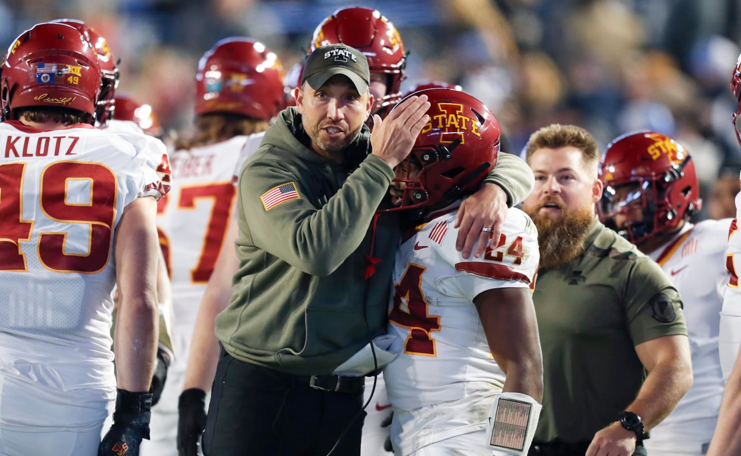 PROVO, UT - NOVEMBER 11:  Matt Campbell head coach of the Iowa State Cyclones congratulates Abu Sama III #24 after he scored a touchdown against the Brigham Young Cougars during the second half of their game at LaVell Edwards Stadium on November 11, 2023 in Provo, Utah.  (Photo by Chris Gardner/Getty Images)
