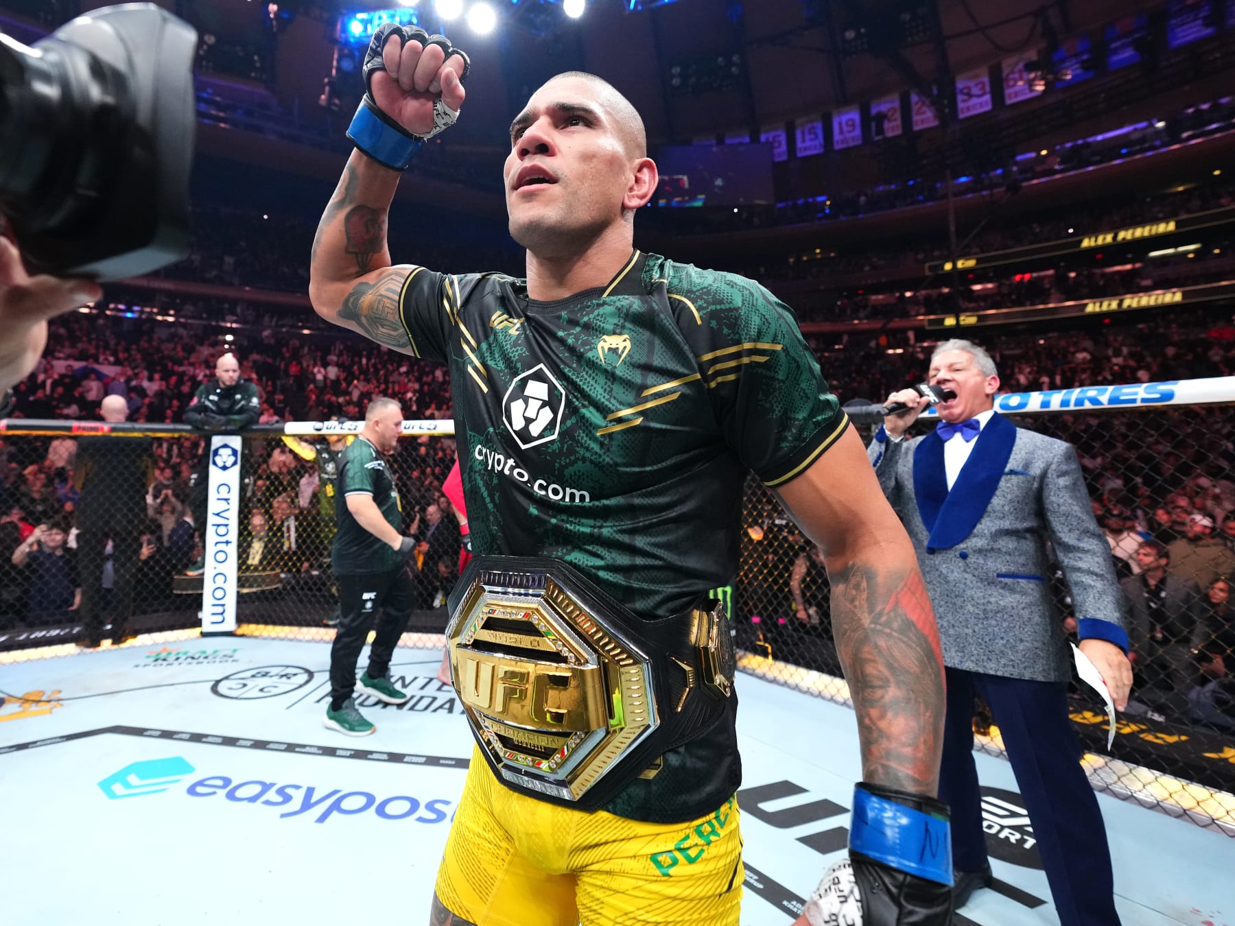 NEW YORK, NEW YORK - NOVEMBER 11: Alex Pereira of Brazil recieves the light heavyweight belt after defeating Jiri Prochazka of the Czech Republic by TKO in the UFC light heavyweight championship fight during the UFC 295 event at Madison Square Garden on November 11, 2023 in New York City. (Photo by Chris Unger/Zuffa LLC via Getty Images)