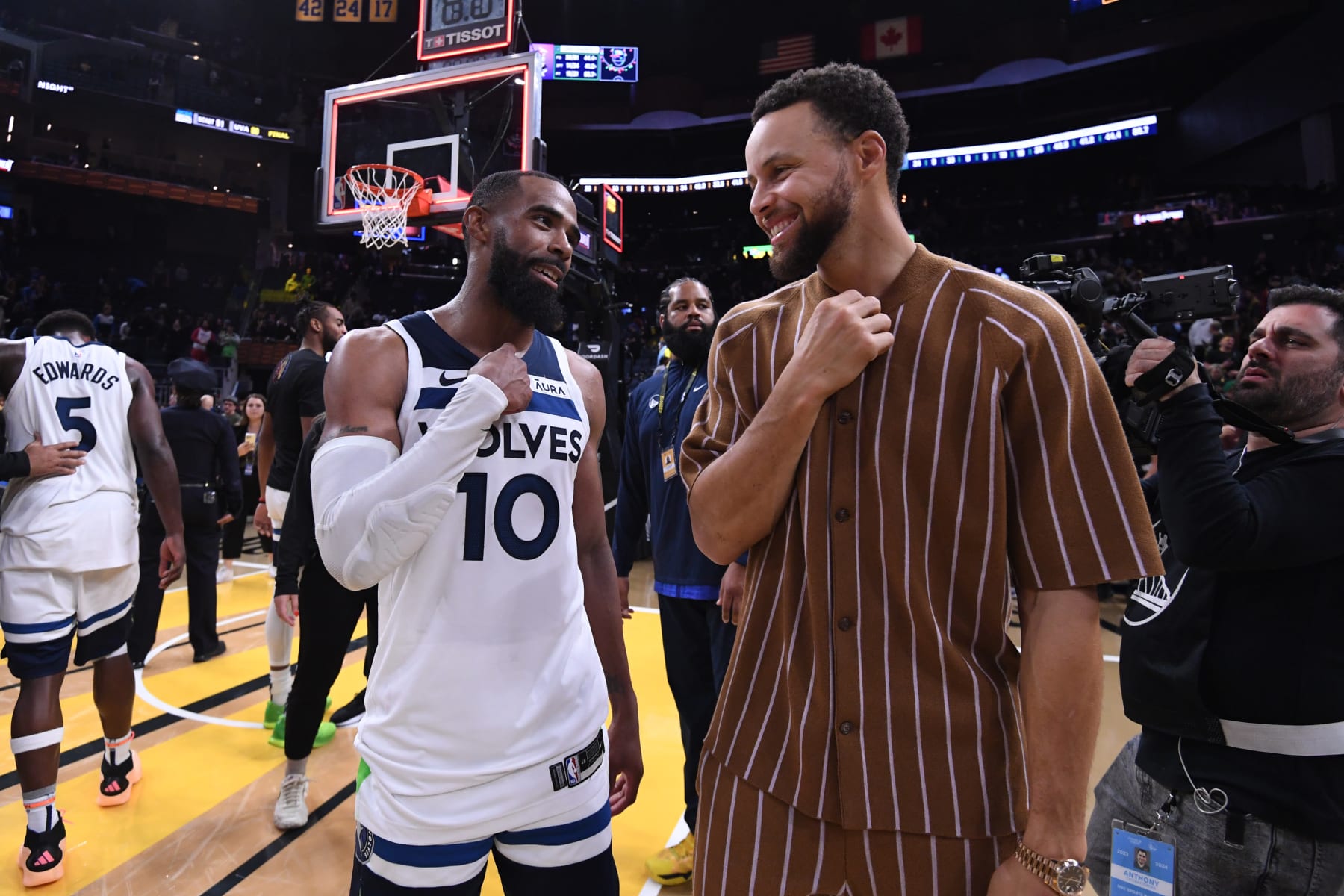 SAN FRANCISCO, CA - NOVEMBER 14: Mike Conley #10 of the Minnesota Timberwolves and Stephen Curry #30 of the Golden State Warriors smile after the game during the In-Season Tournament on November 14, 2023 at Chase Center in San Francisco, California. NOTE TO USER: User expressly acknowledges and agrees that, by downloading and or using this photograph, user is consenting to the terms and conditions of Getty Images License Agreement. Mandatory Copyright Notice: Copyright 2023 NBAE (Photo by Noah Graham/NBAE via Getty Images)