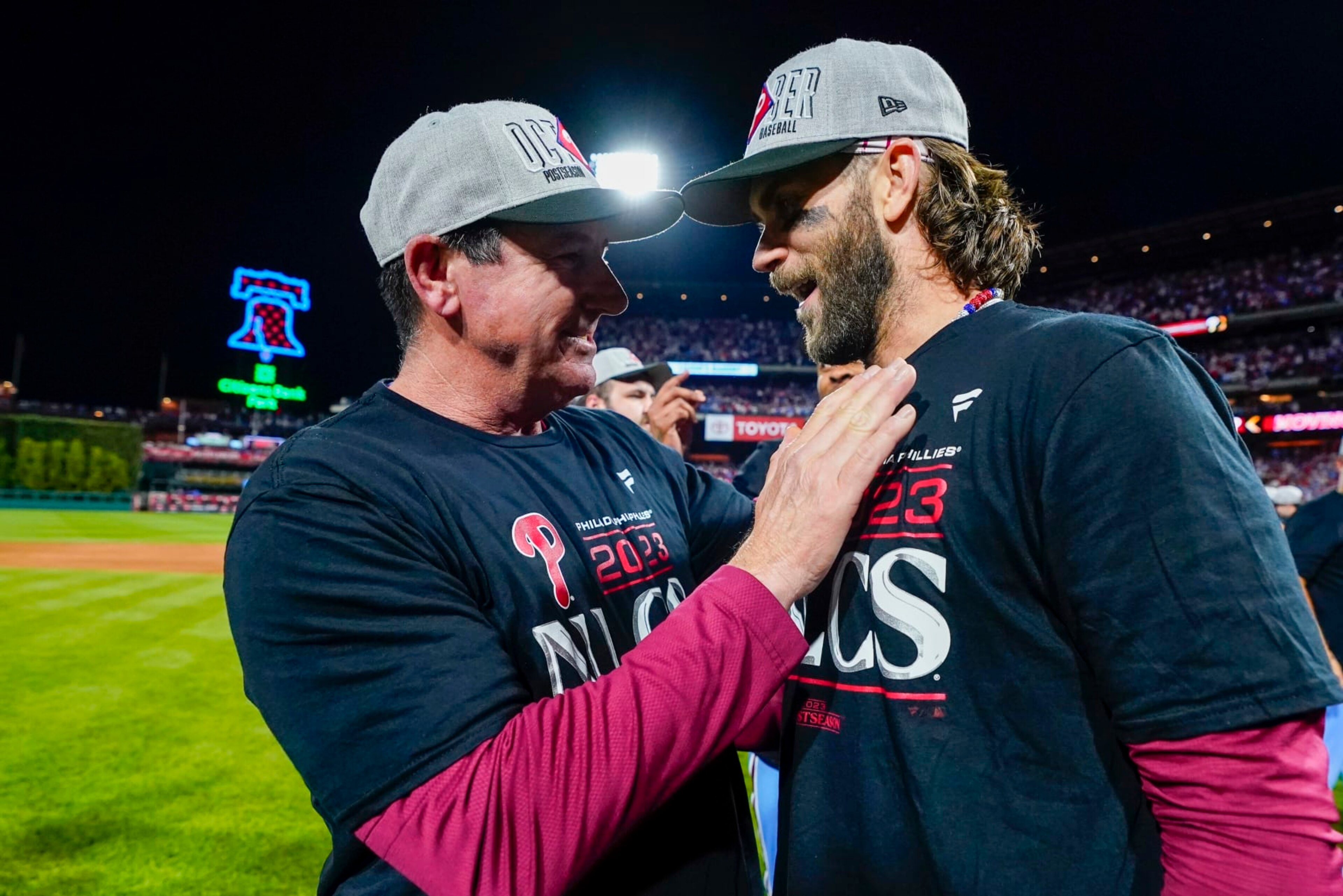 Philadelphia Phillies manager Rob Thomson and Bryce Harper celebrate after Game 4 of a baseball NL Division Series against the Atlanta Braves Thursday, Oct. 12, 2023, in Philadelphia. The Phillies won 3-1 to win the series. (AP Photo/Chris Szagola) Philadelphia Phillies manager Rob Thomson and Bryce Harper celebrate after Game 4 of a baseball NL Division Series against the Atlanta Braves Thursday, Oct. 12, 2023, in Philadelphia. The Phillies won 3-1 to win the series. (AP Photo/Chris Szagola)