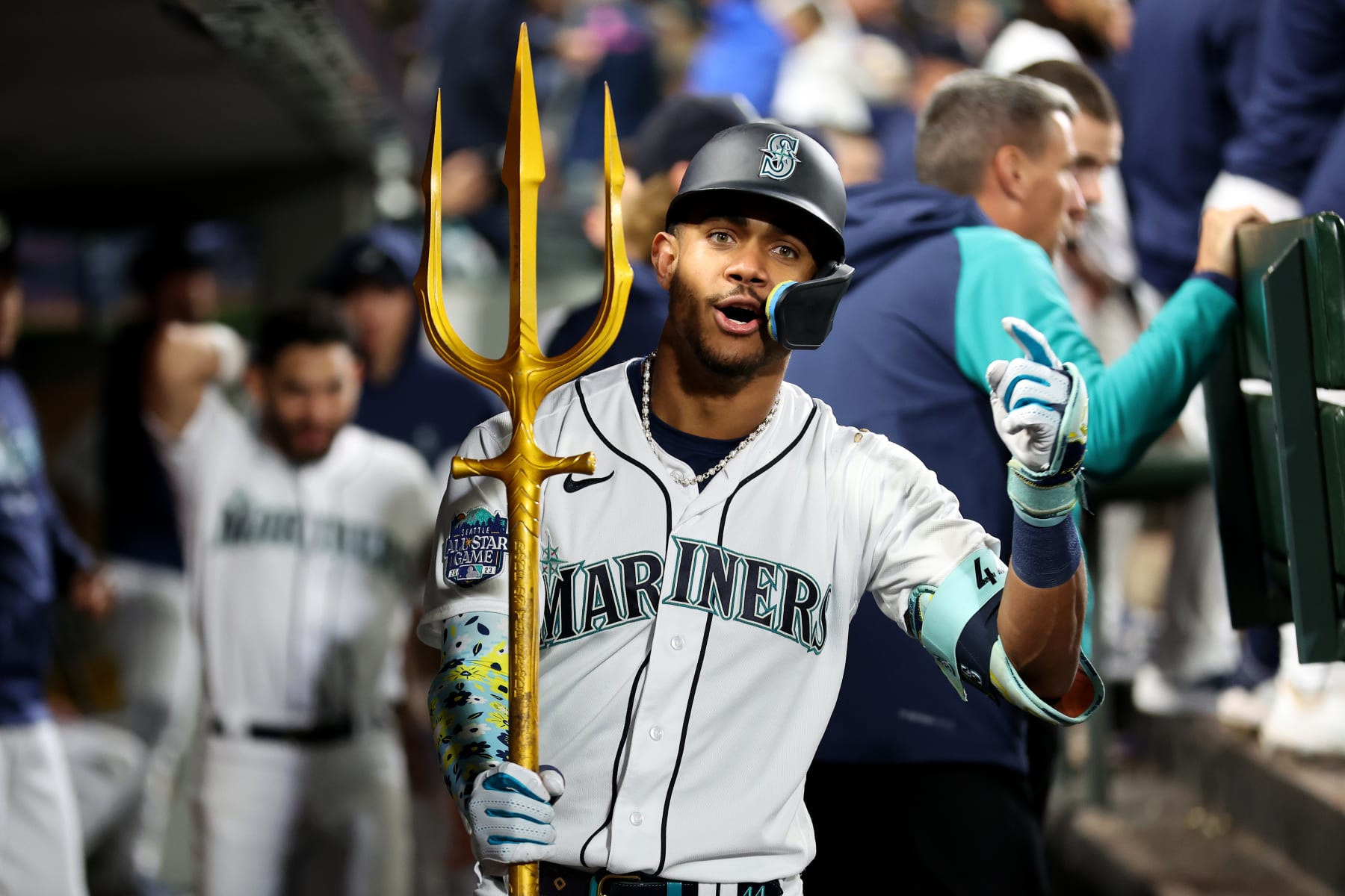 SEATTLE, WASHINGTON - SEPTEMBER 28: Julio Rodriguez #44 of the Seattle Mariners celebrates his solo home run with the trident prop during the fourth inning against the Texas Rangers at T-Mobile Park on September 28, 2023 in Seattle, Washington. (Photo by Steph Chambers/Getty Images)