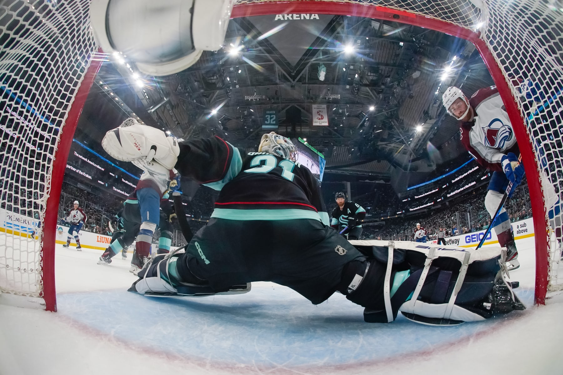 SEATTLE, WASHINGTON - APRIL 28: Philipp Grubauer #31 of the Seattle Kraken makes a pad save on J.T. Compher #37 of the Colorado Avalanche on a power-play during the second period in Game Six of the First Round of the 2023 Stanley Cup Playoffs at Climate Pledge Arena on April 28, 2023 in Seattle, Washington. (Photo by Christopher Mast/NHLI via Getty Images)